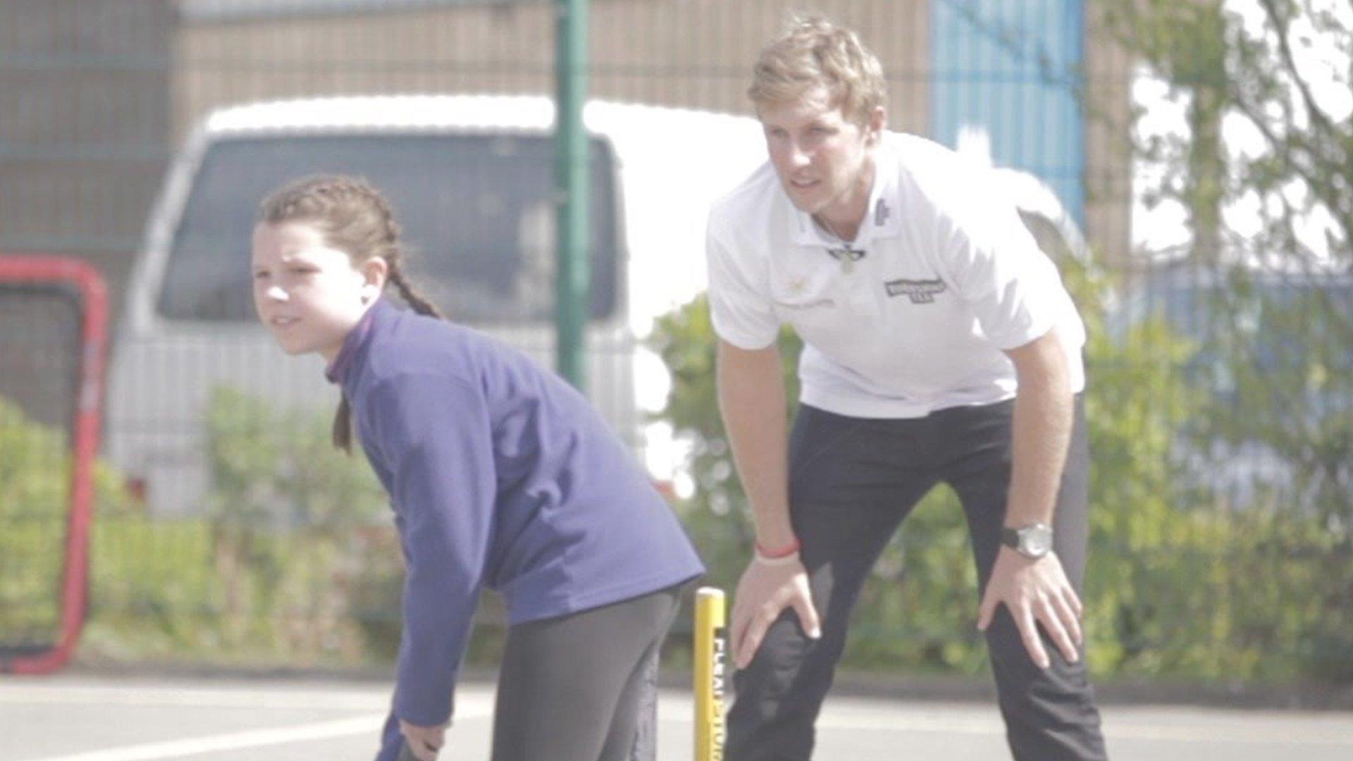 Joe Root plays cricket with schoolchildren