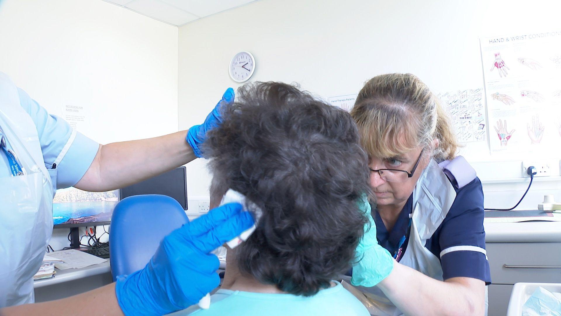 Jean Manley being injected with botox at a headache clinic in Torbay