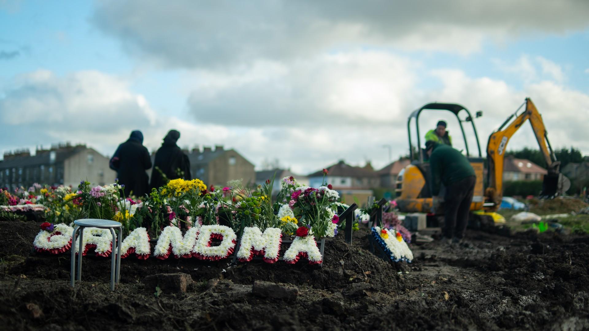 A digger at work at Scholemoor cemetery