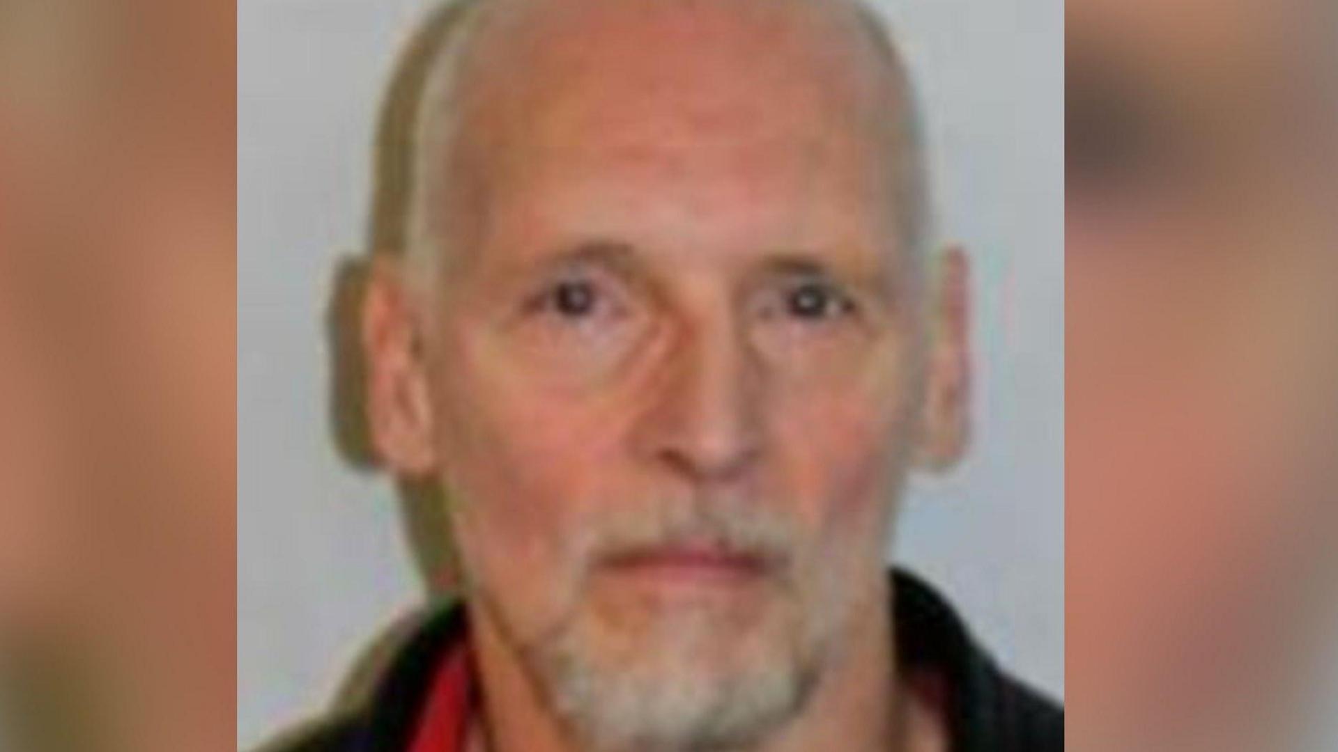 Torben Stig Hersborg, a balding man with white hair and white beard