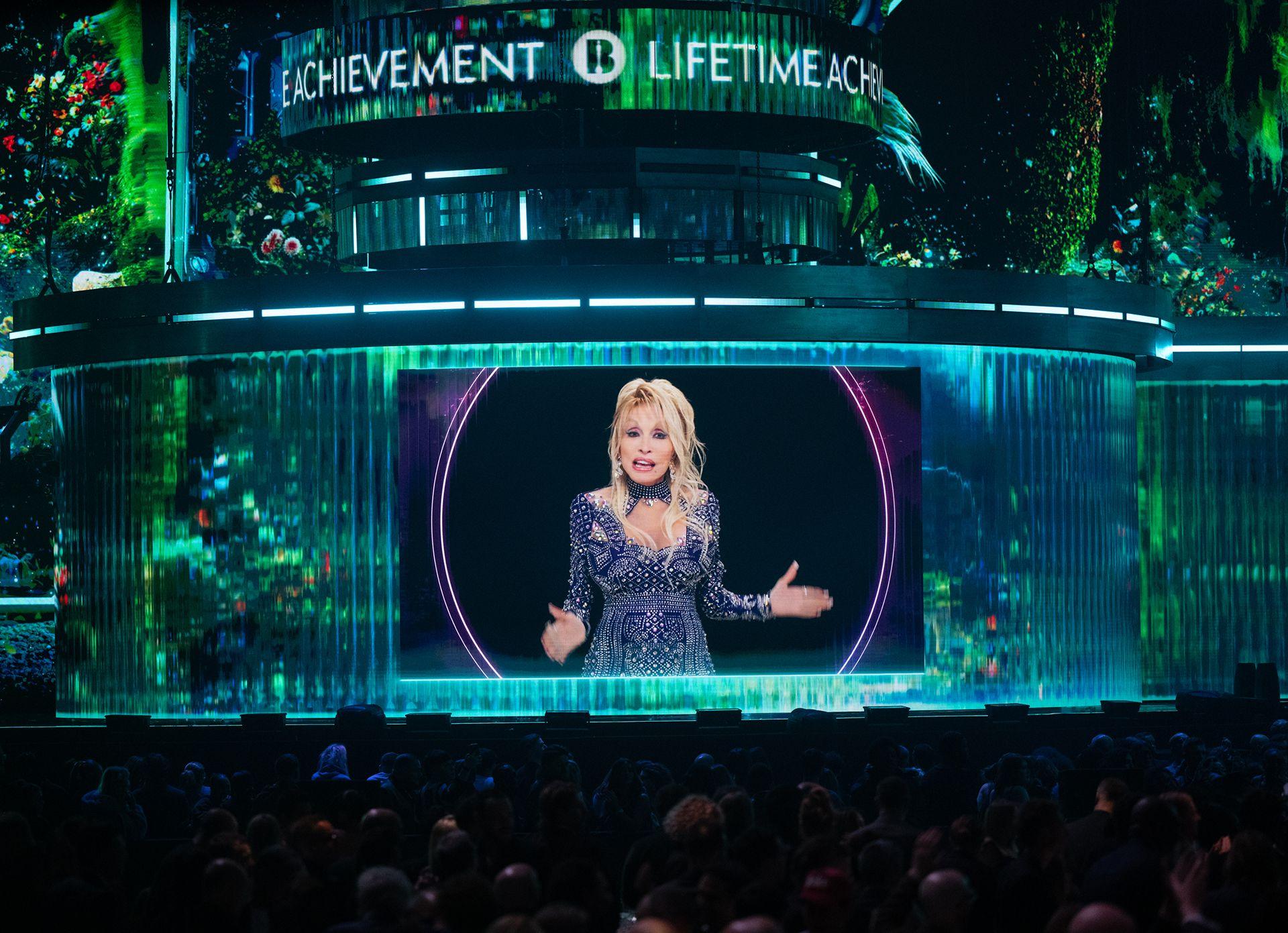 Dolly Parton gives a speech after Ozzy Osbourne won the Lifetime Achievement Award during The BRIT Awards 2026 at Co-op Live on February 28, 2026 in Manchester, England.