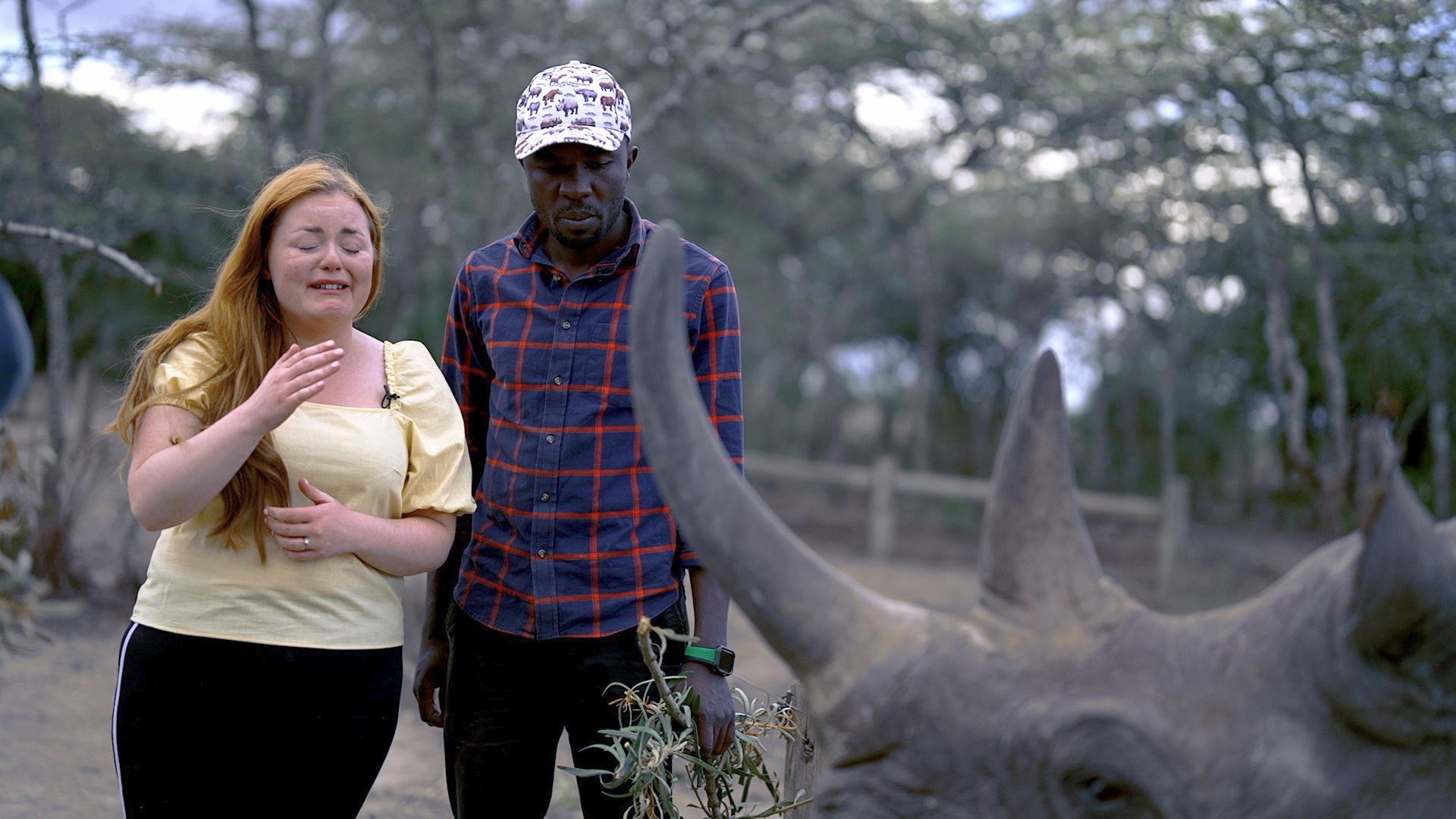 Lucy with James Mwenda and Barak the blind rhino