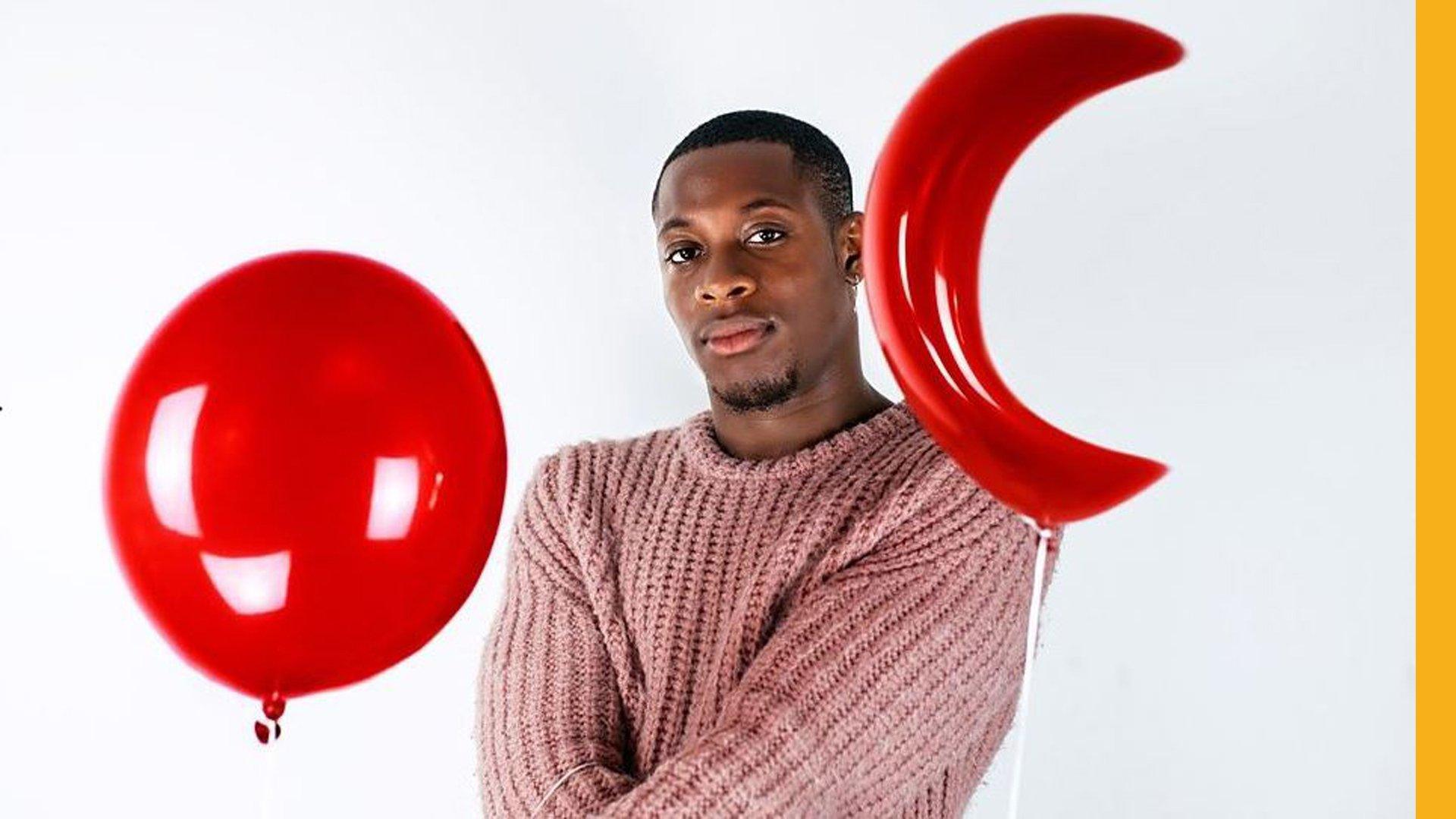 Chris with blood red balloons