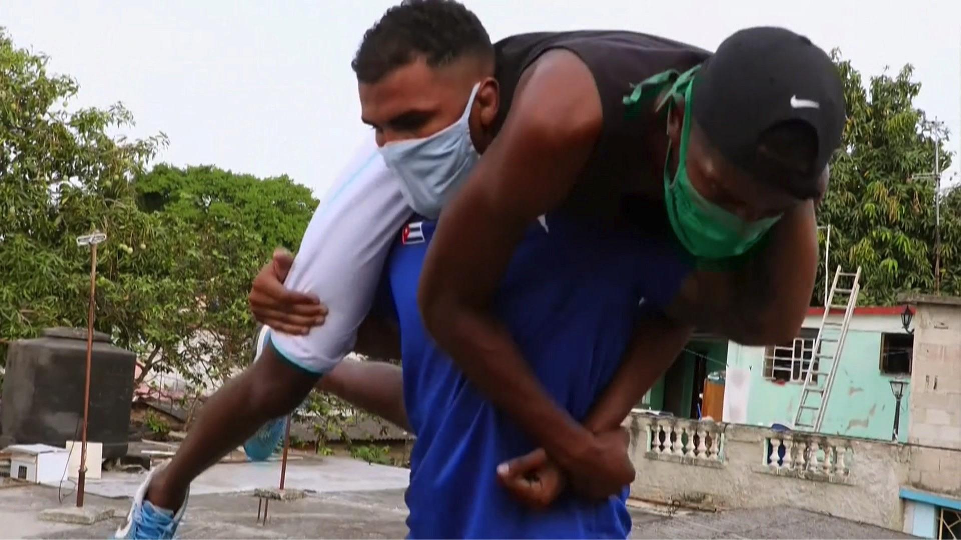 Cuban boxer lifting trainer