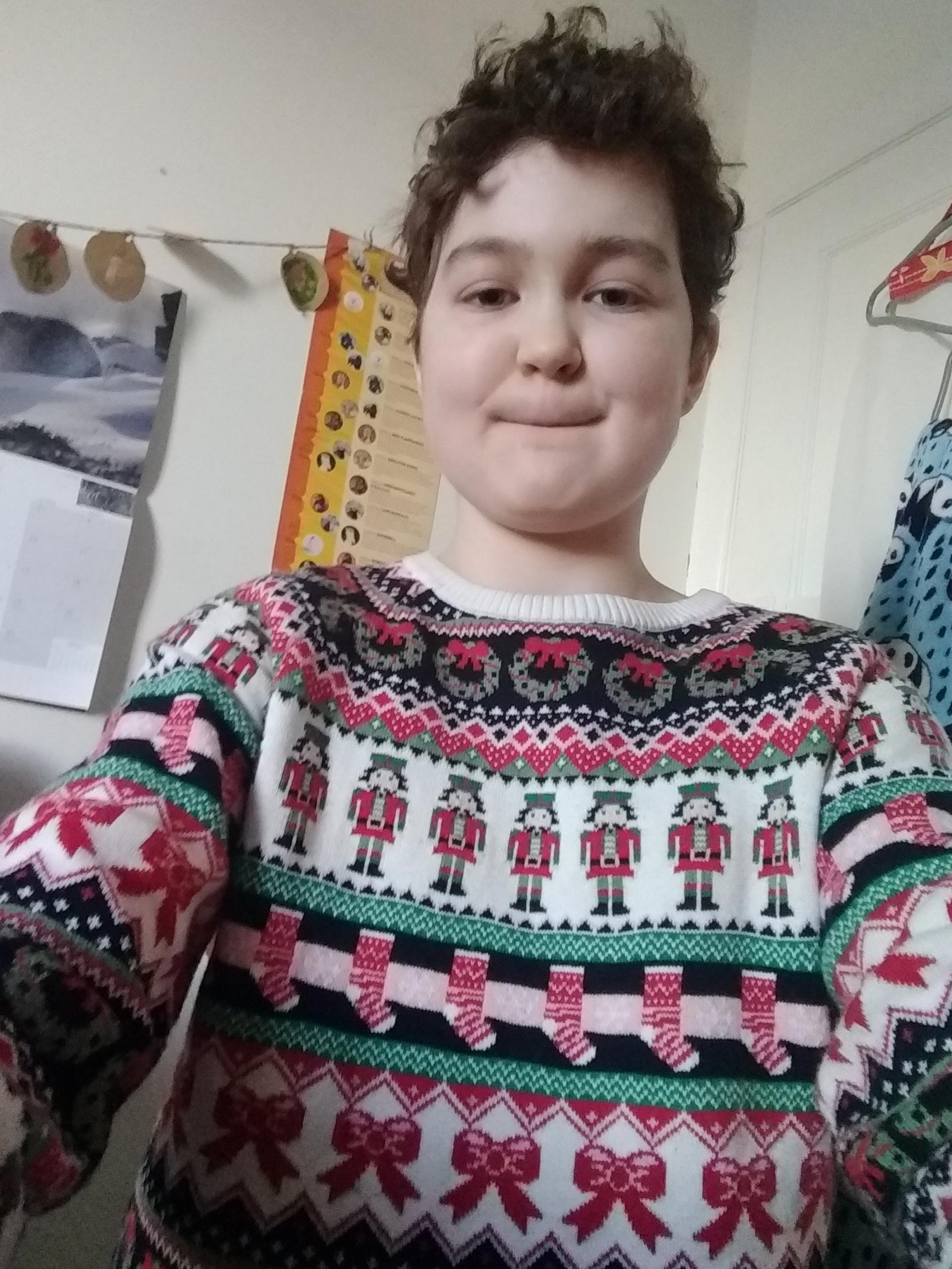 person in christmas jumper with patterns