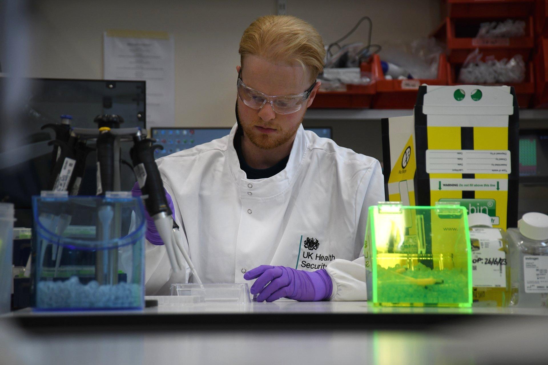 A lab technician prepares samples at one of the new labs at the Health Security Agency, Porton Down, in Salisbury