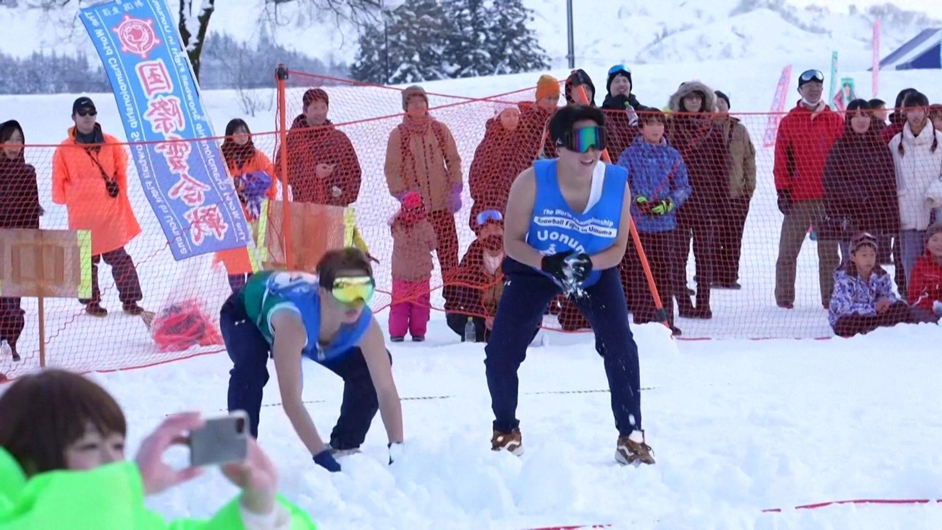 Competitors taking part in a snowball fight. 