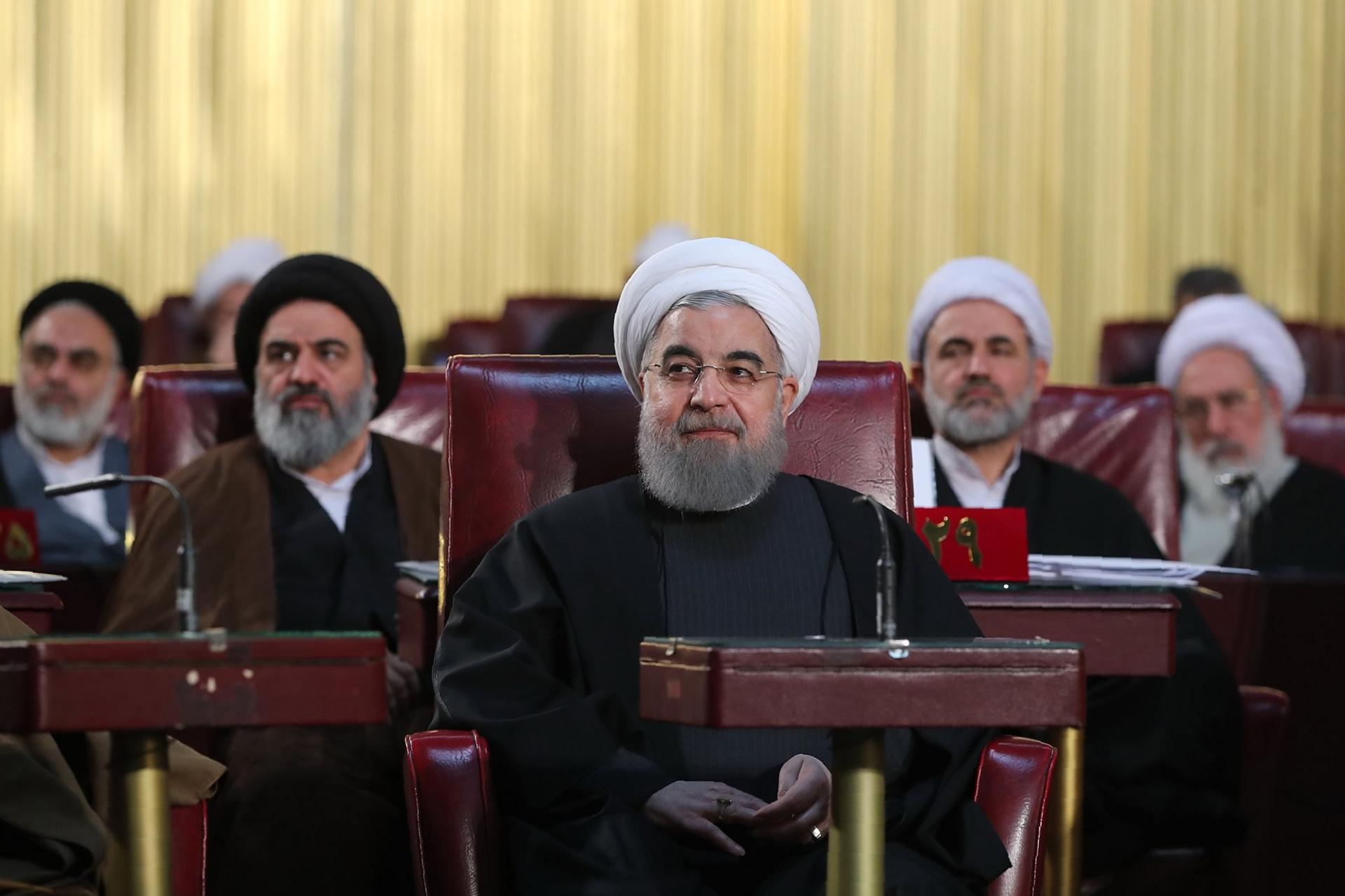 A handout picture provided by the Iranian Presidency shows Iran's President Hassan Rouhani (C) attending a session of Iran"s Assembly of Experts in Tehran on March 7, 2017.