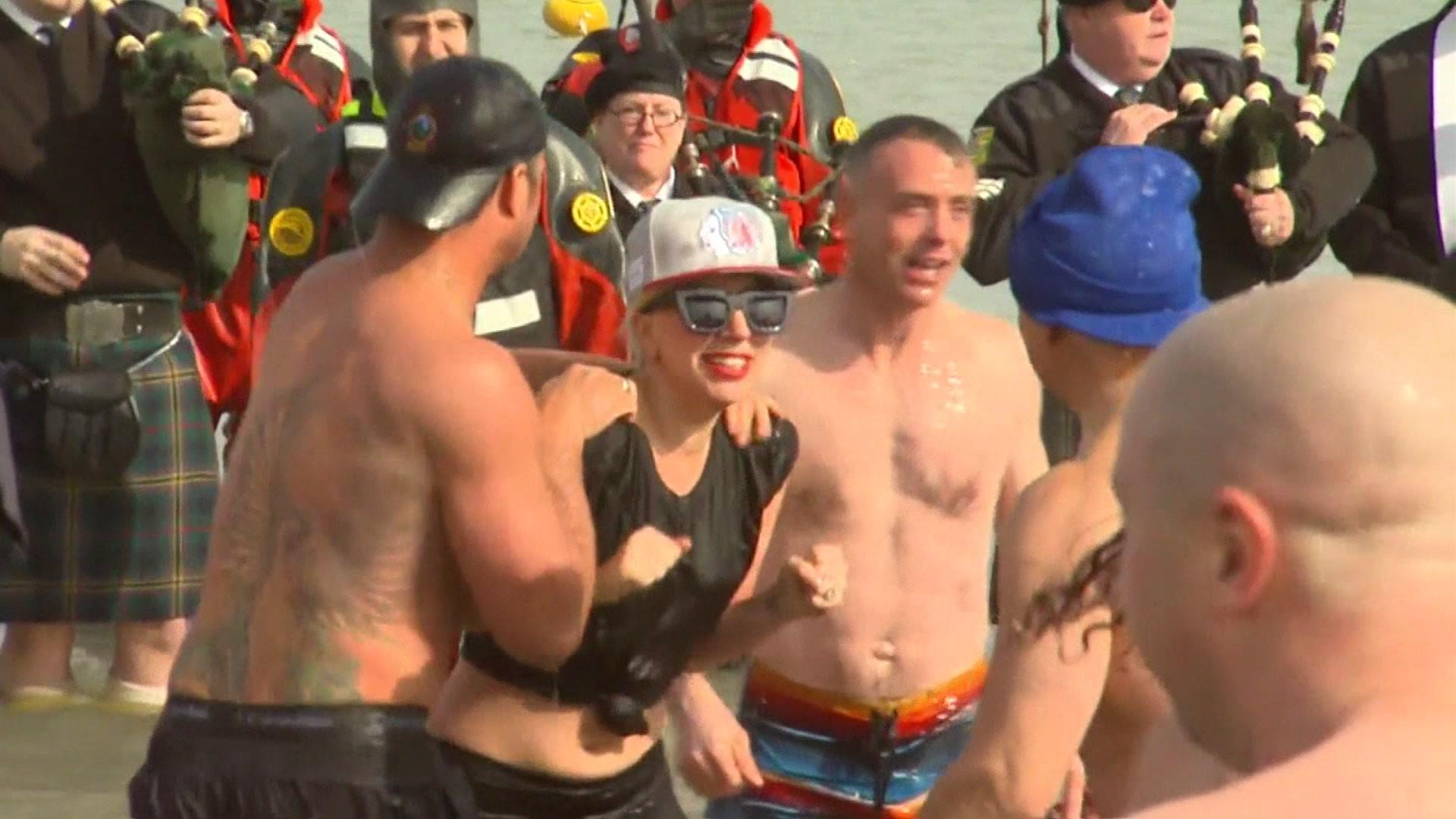 Lady Gaga takes icy plunge