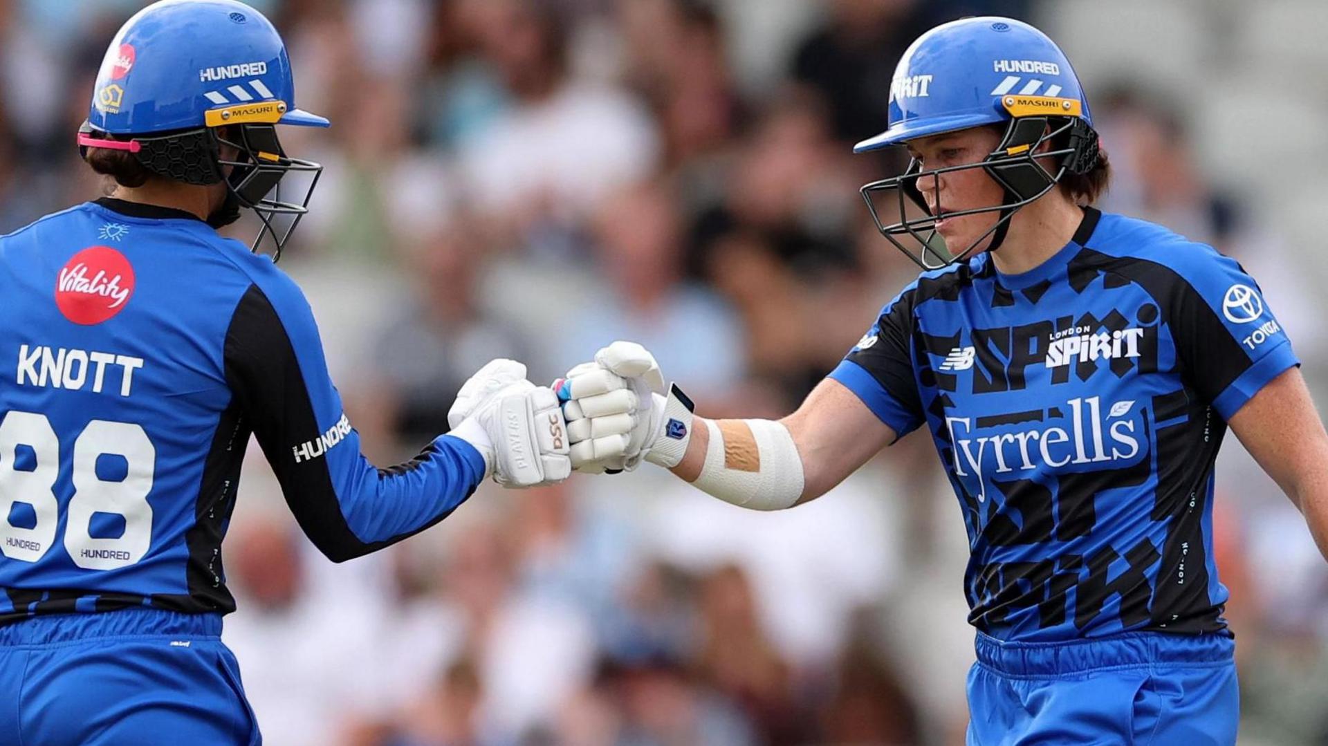 Grace Harris punches gloves after boundary
