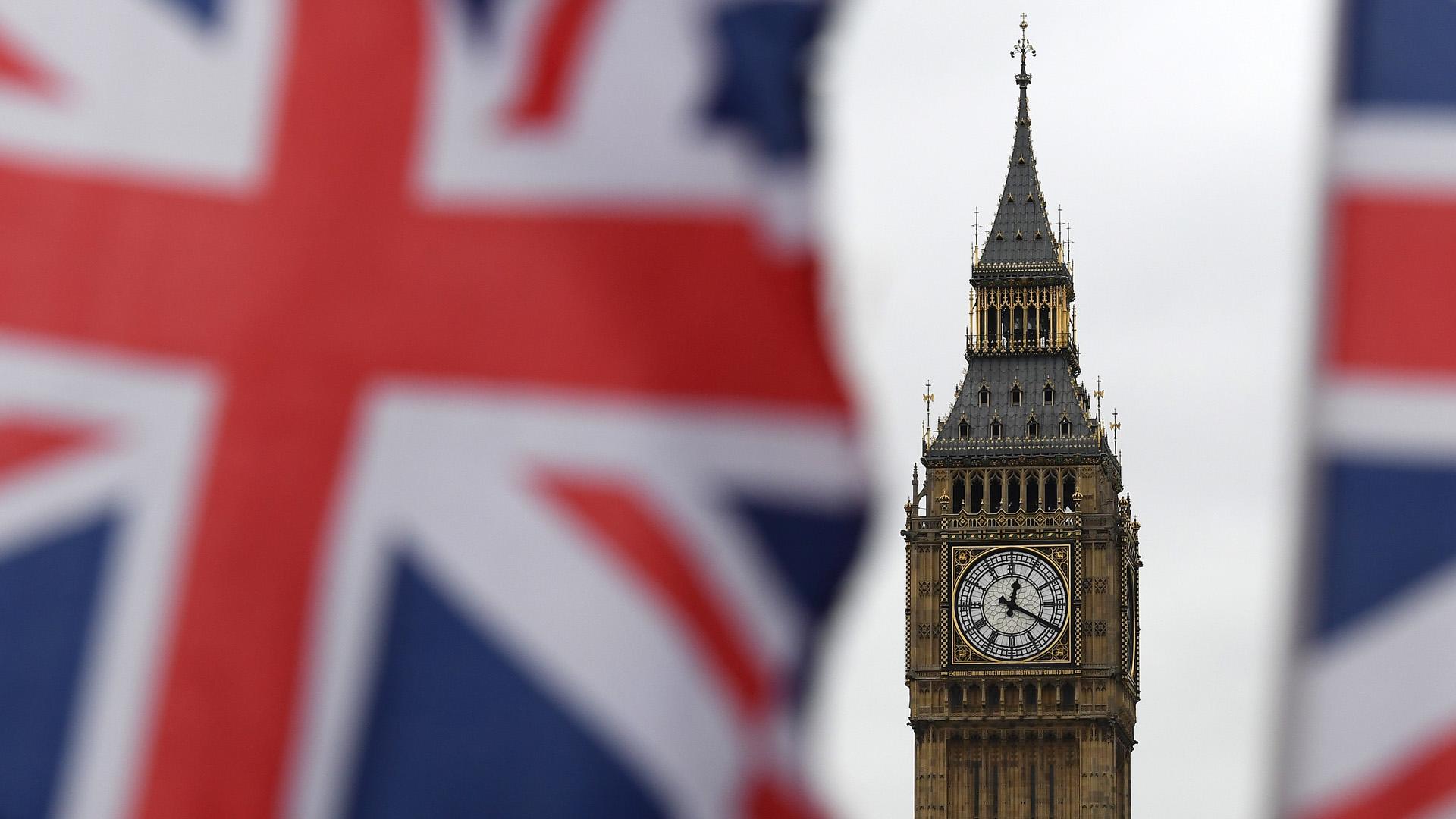 Big Ben between flags