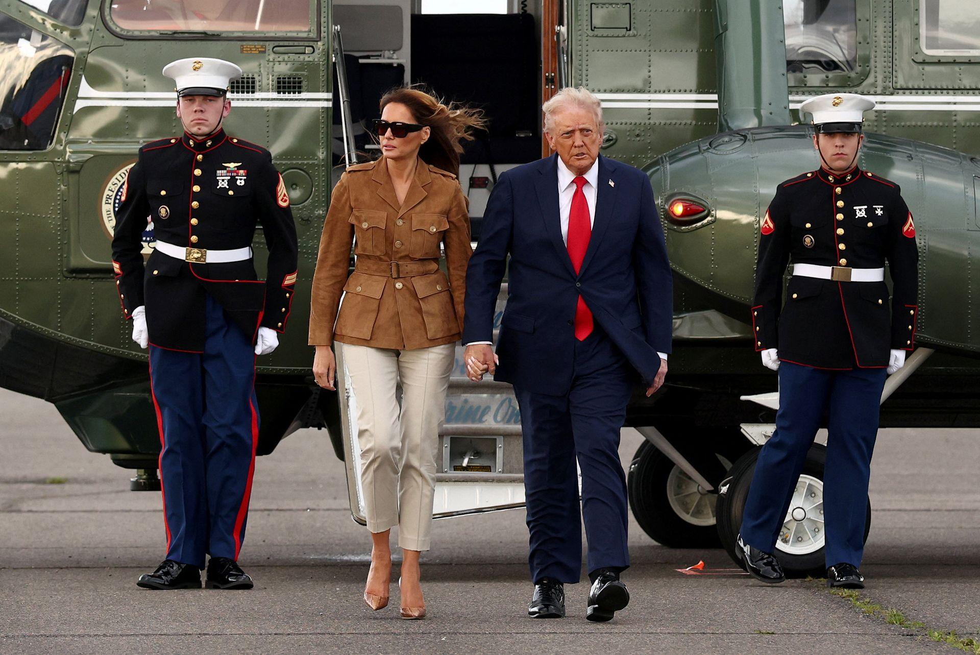 President Donald Trump and first lady Melania Trump walk to board Air Force One, as they depart from London Stansted Airport, in Stansted near London, Britain September 18, 2025