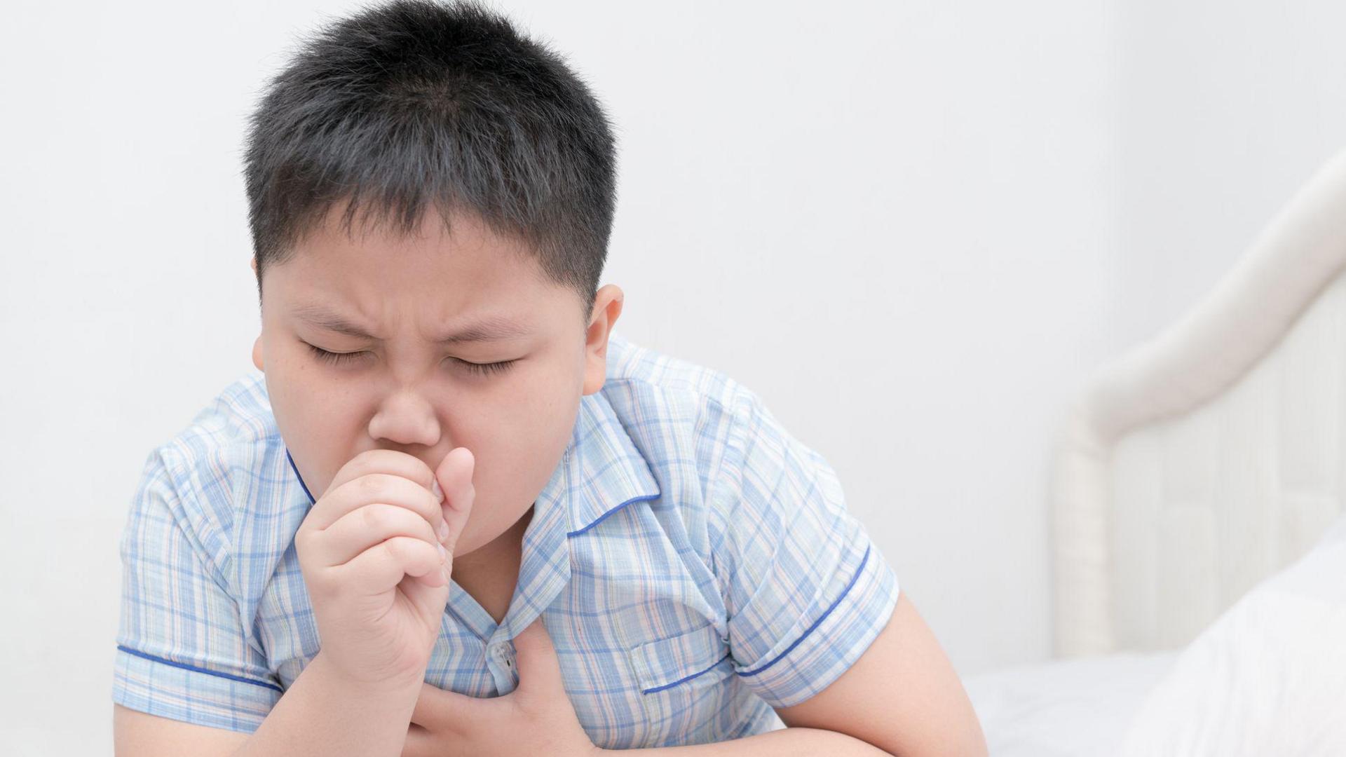 Boy coughing 