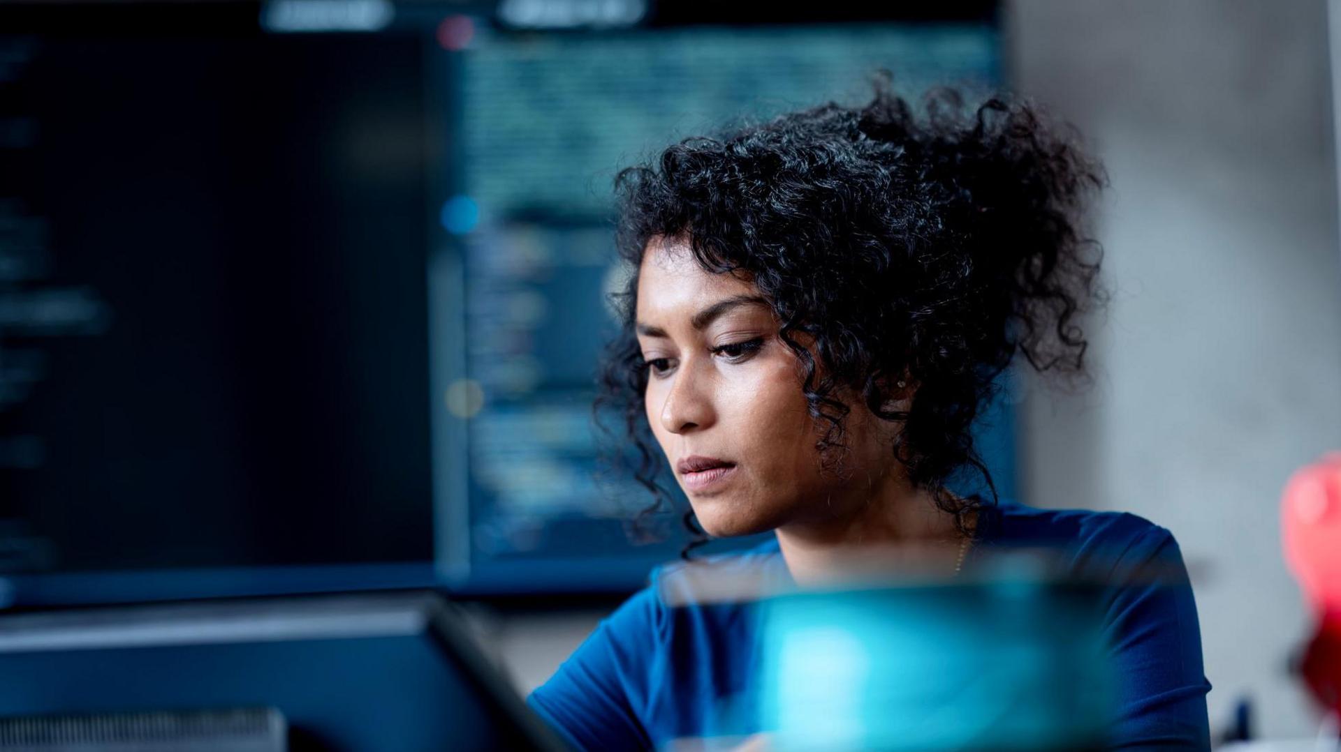 Young woman working at a computer