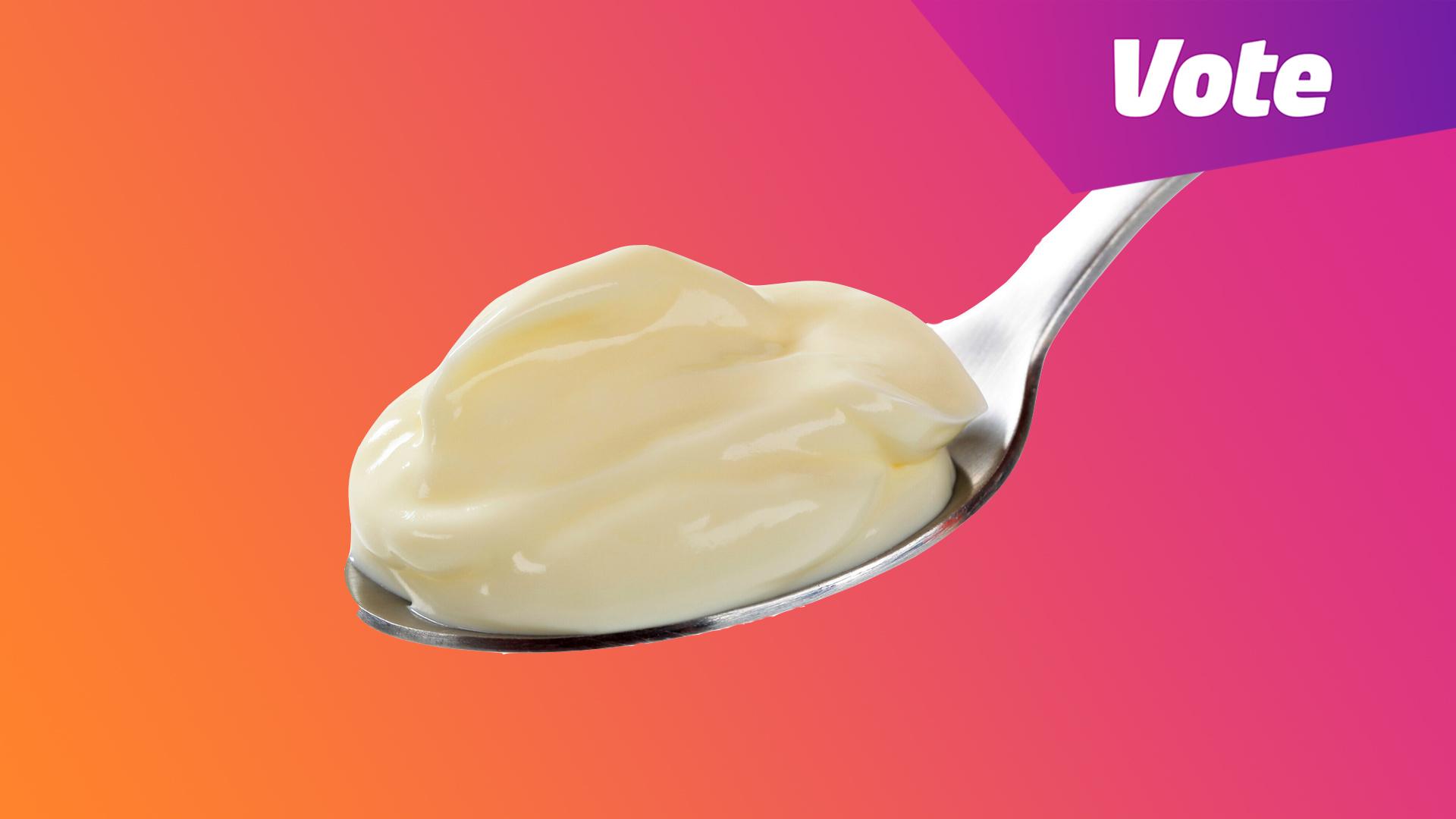 Spoon with custard on it.