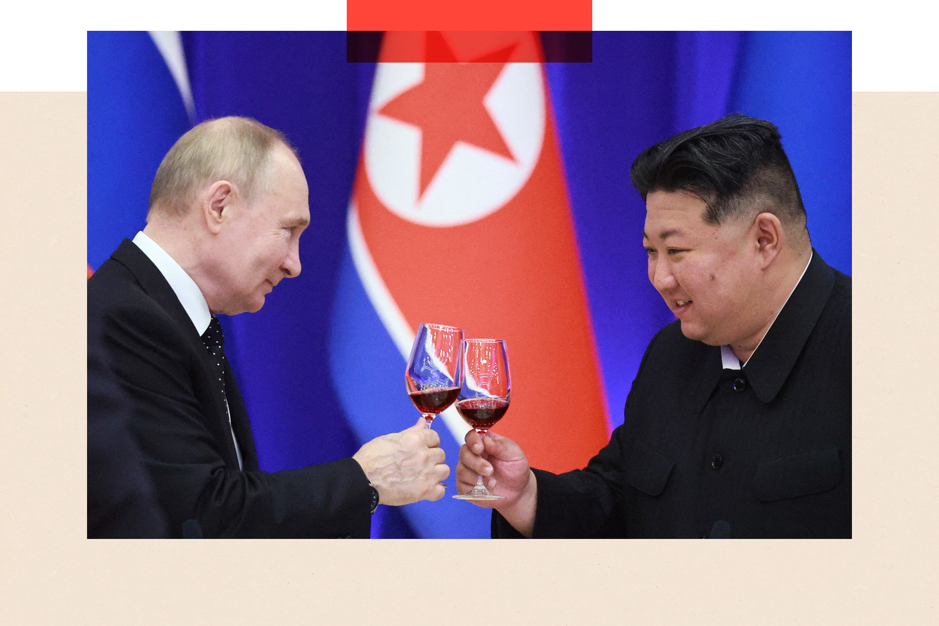 Russian President Vladimir Putin and North Korean leader Kim Jong Un toast during a reception at the Mongnangwan Reception House in Pyongyang 