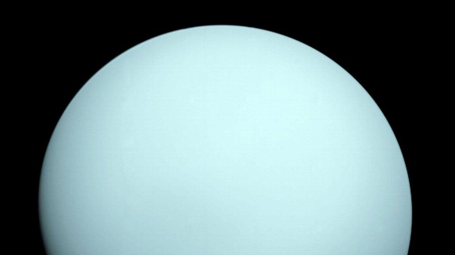 A light blue planet in space