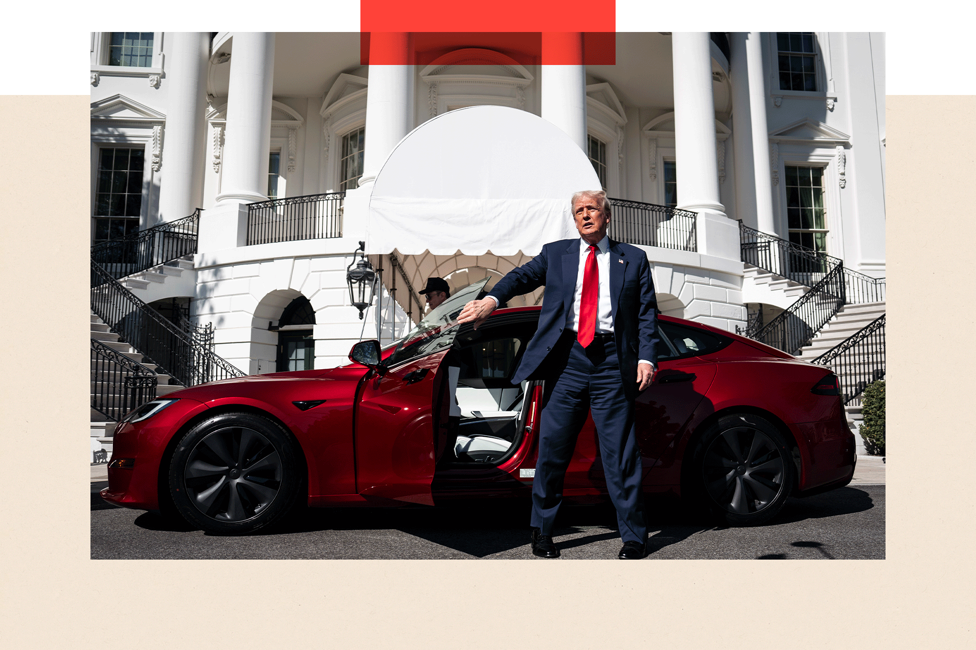 Donald Trump stands next to a Tesla in front of the White House