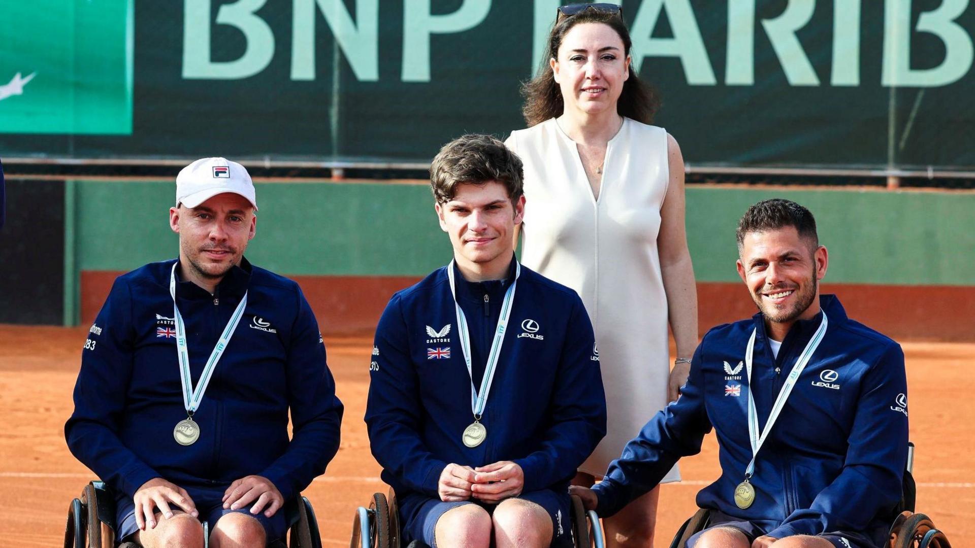 British wheelchair tennis players Andy Lapthorne (left), Greg Slade (centre) and Gary Cox (right) with their bronze medals from the World Team Cup