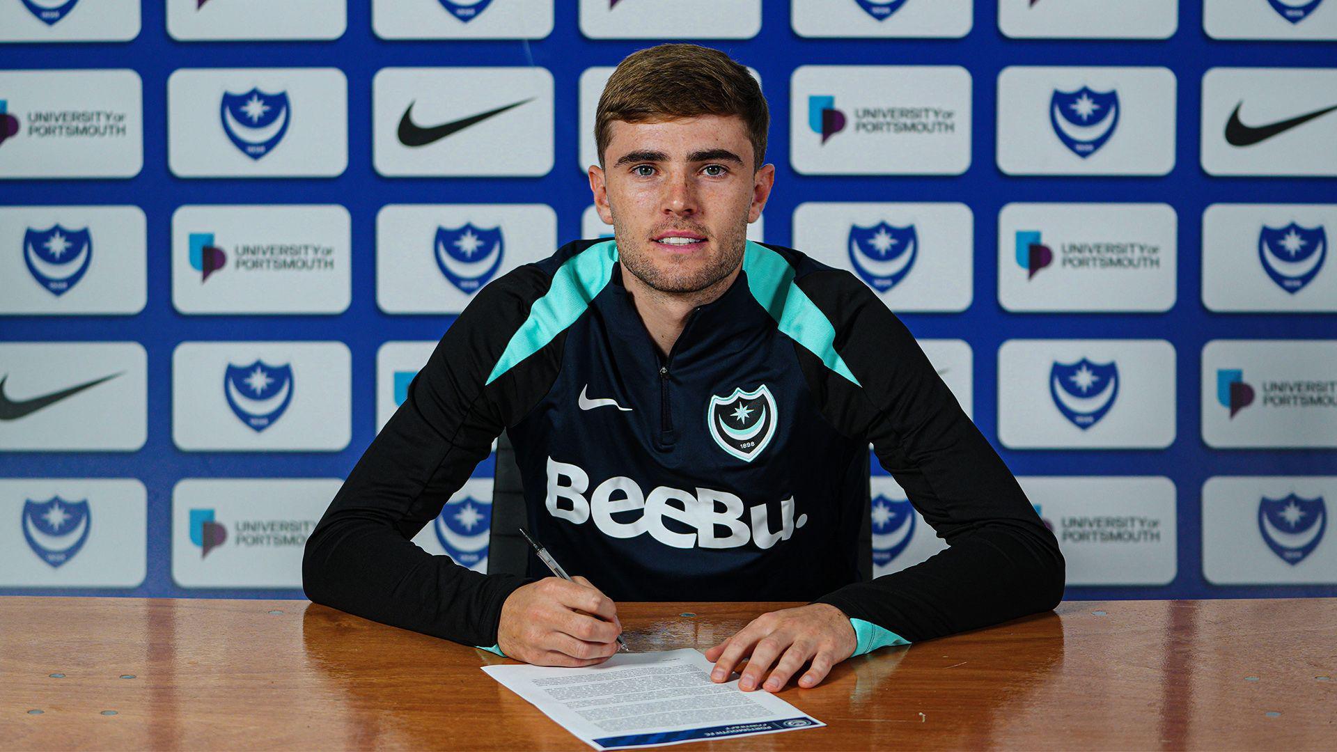 Portsmouth defender Zak Swanson signs his new Pompey deal.