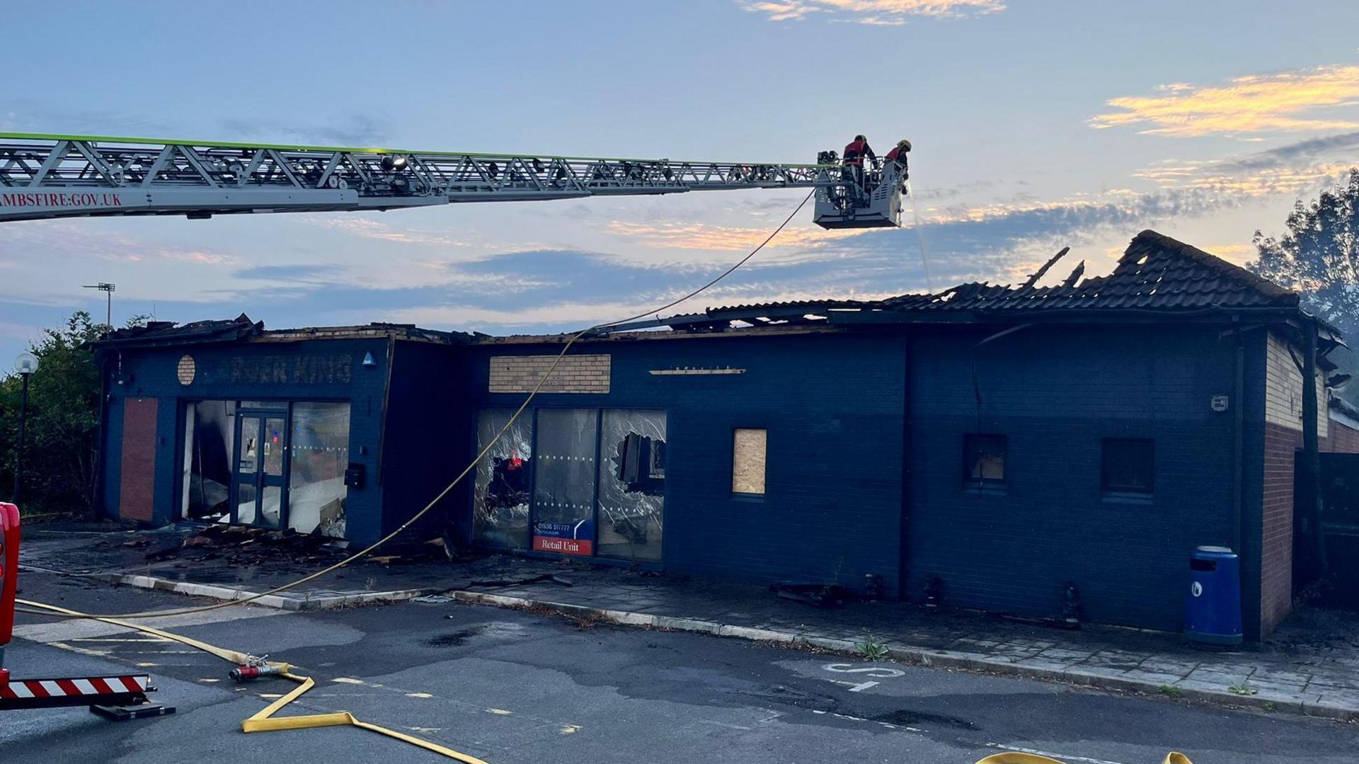 Fire crews putting out a building fire