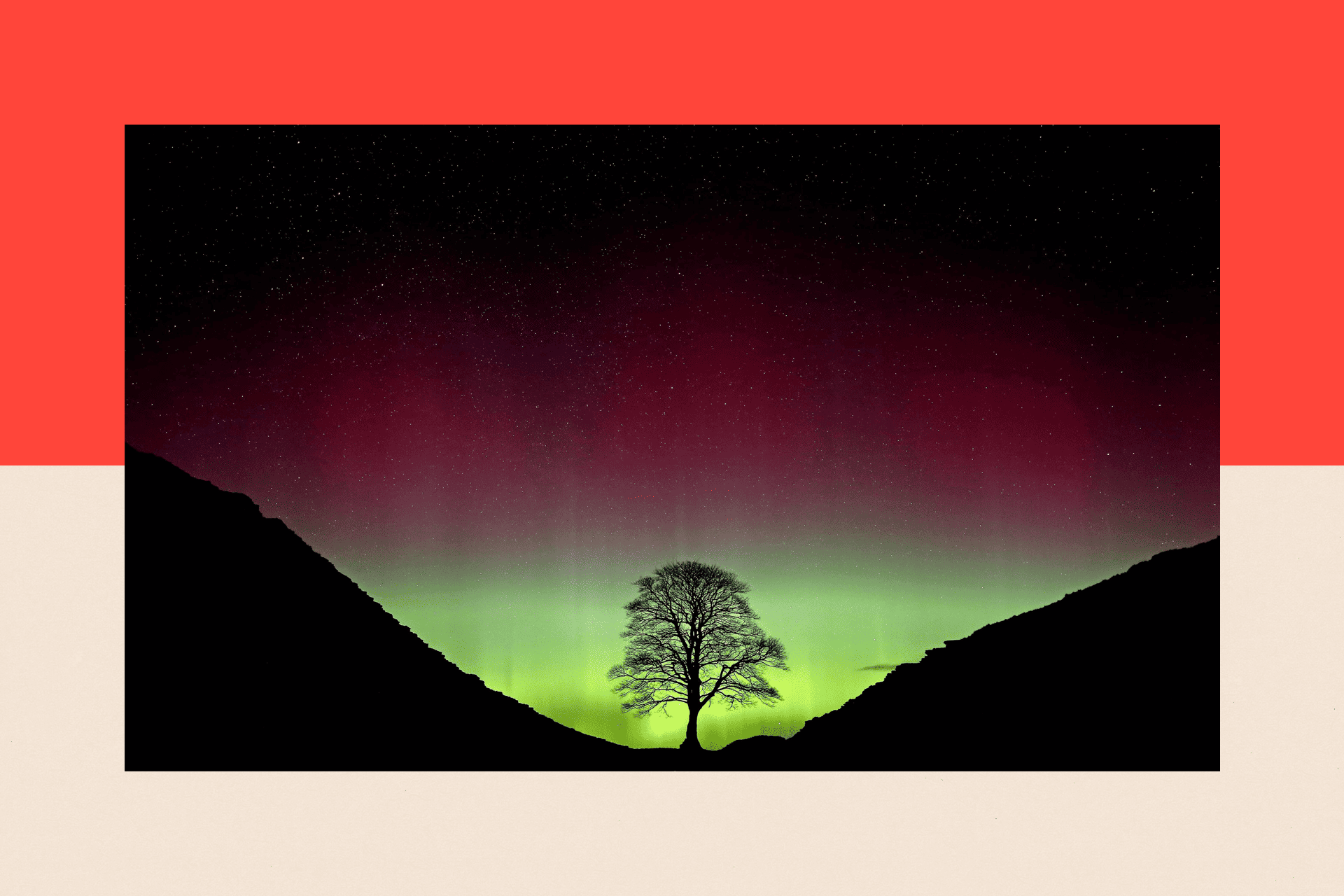 The Northern Lights, or Aurora Borealis, shining over the Sycamore Gap