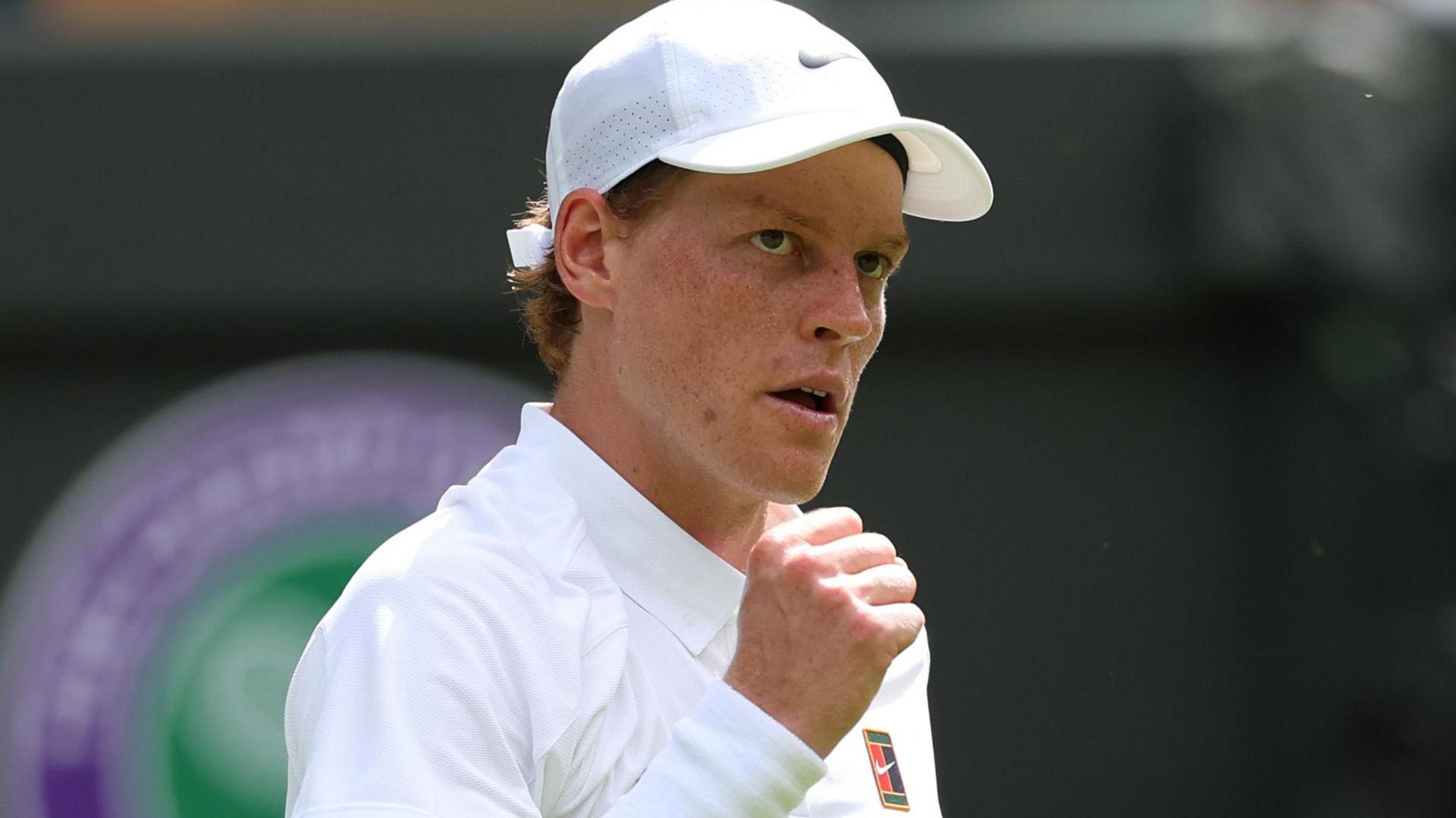 Jannik Sinner celebrates his opening win at Wimbledon