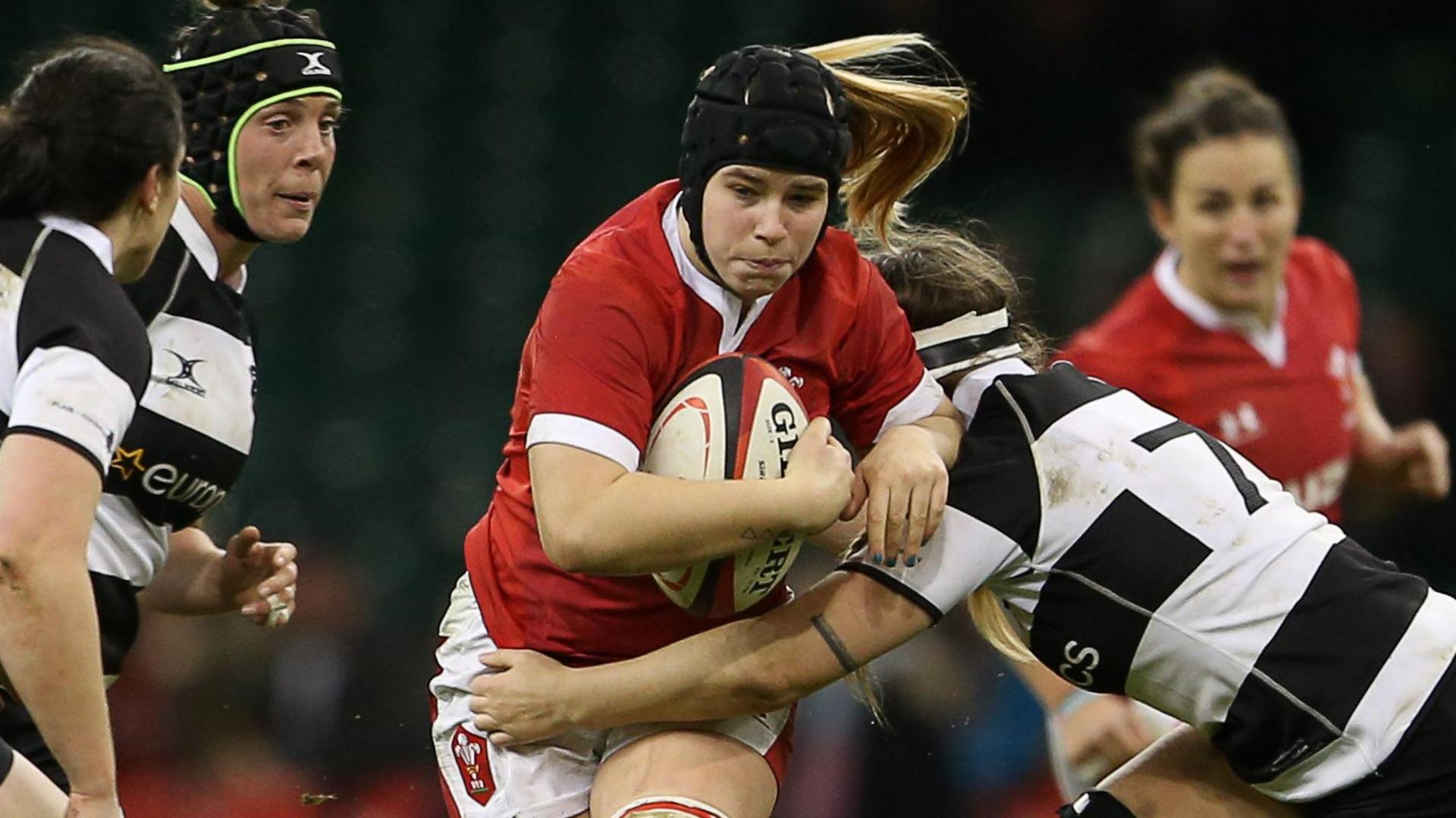 Wales forward Bethan Lewis carries the ball against the Barbarians