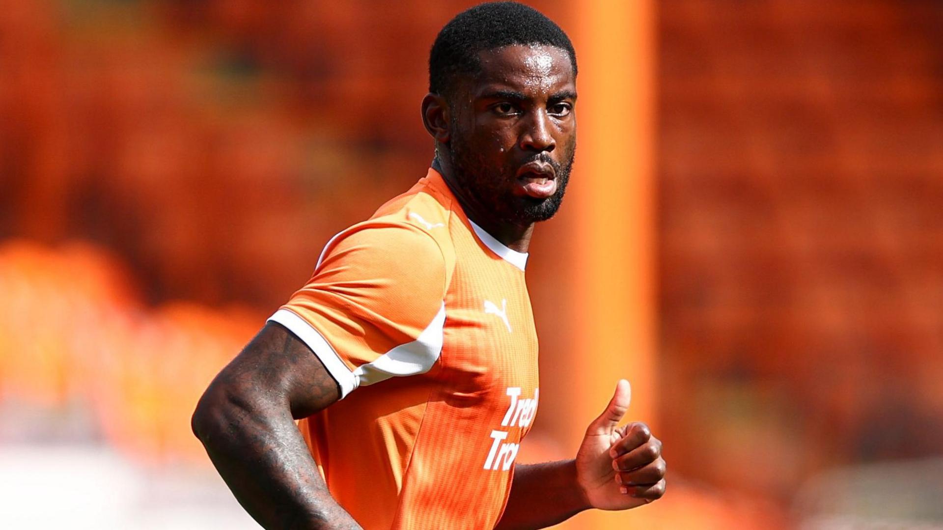 Kylian Kouassi in action for Blackpool