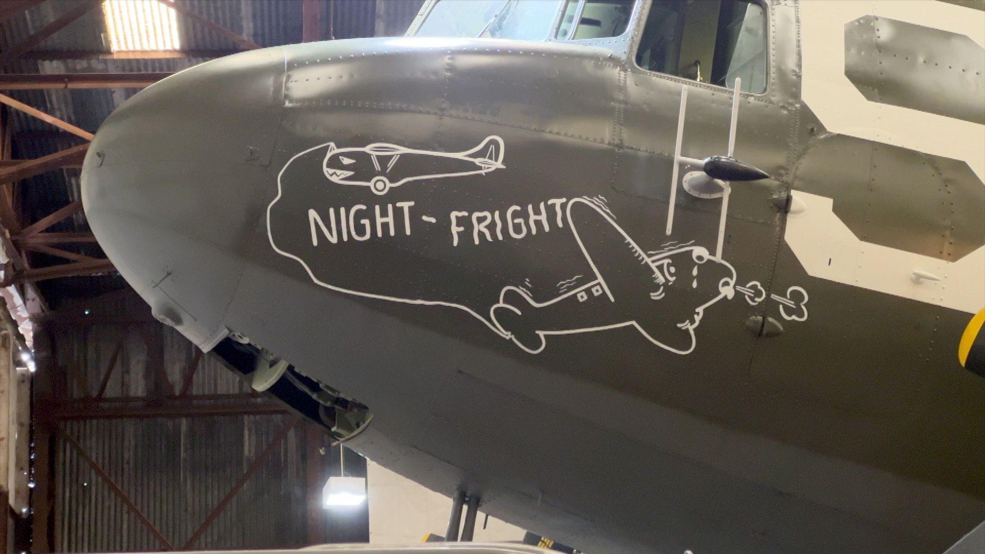 The text NIGHT-FRIGHT can be seen on the front of the Douglas C-47 Skytrain that is being restored