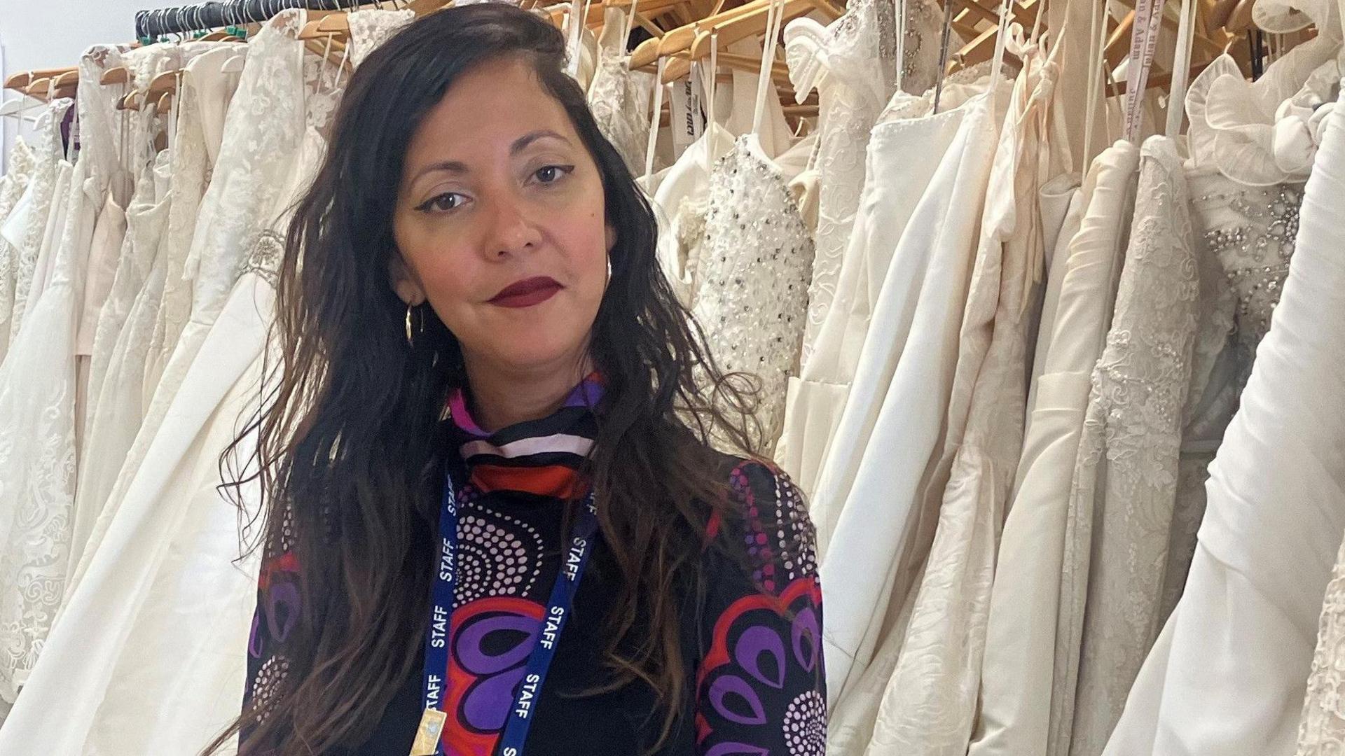 Photo of Fernanda Da Costa, who runs a second hand wedding dress store in Stockport town centre 