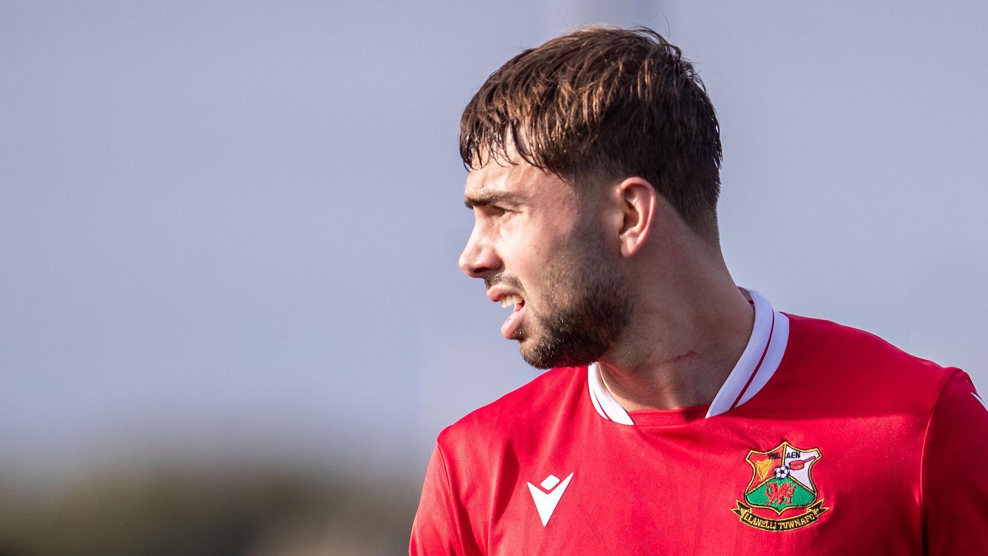 Ethan Cann looks on during a Llanelli game