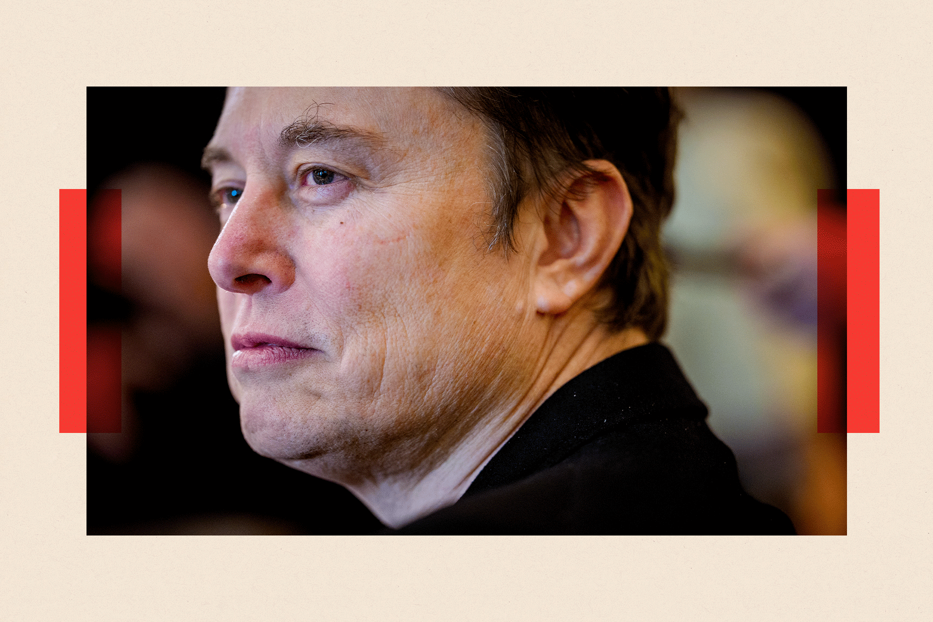 Elon Musk looking away from the camera