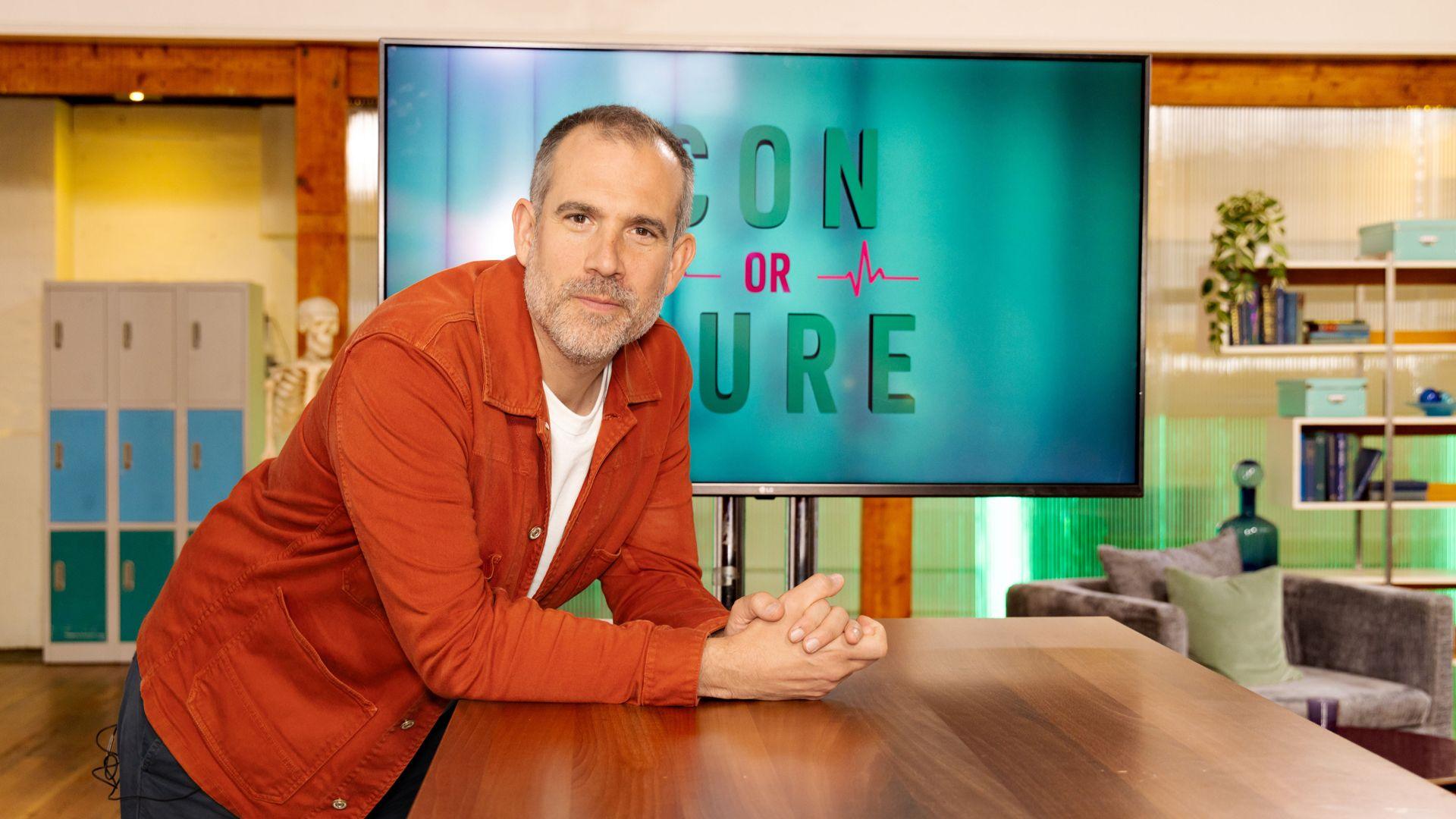 Dr Xand on the set of Con or Cure