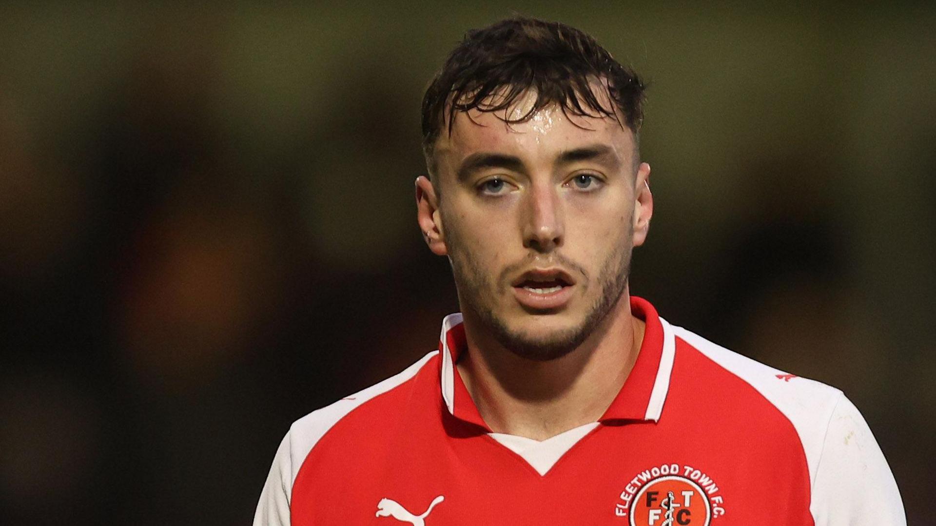 Harrison Holgate in action for Fleetwood Town earlier this season