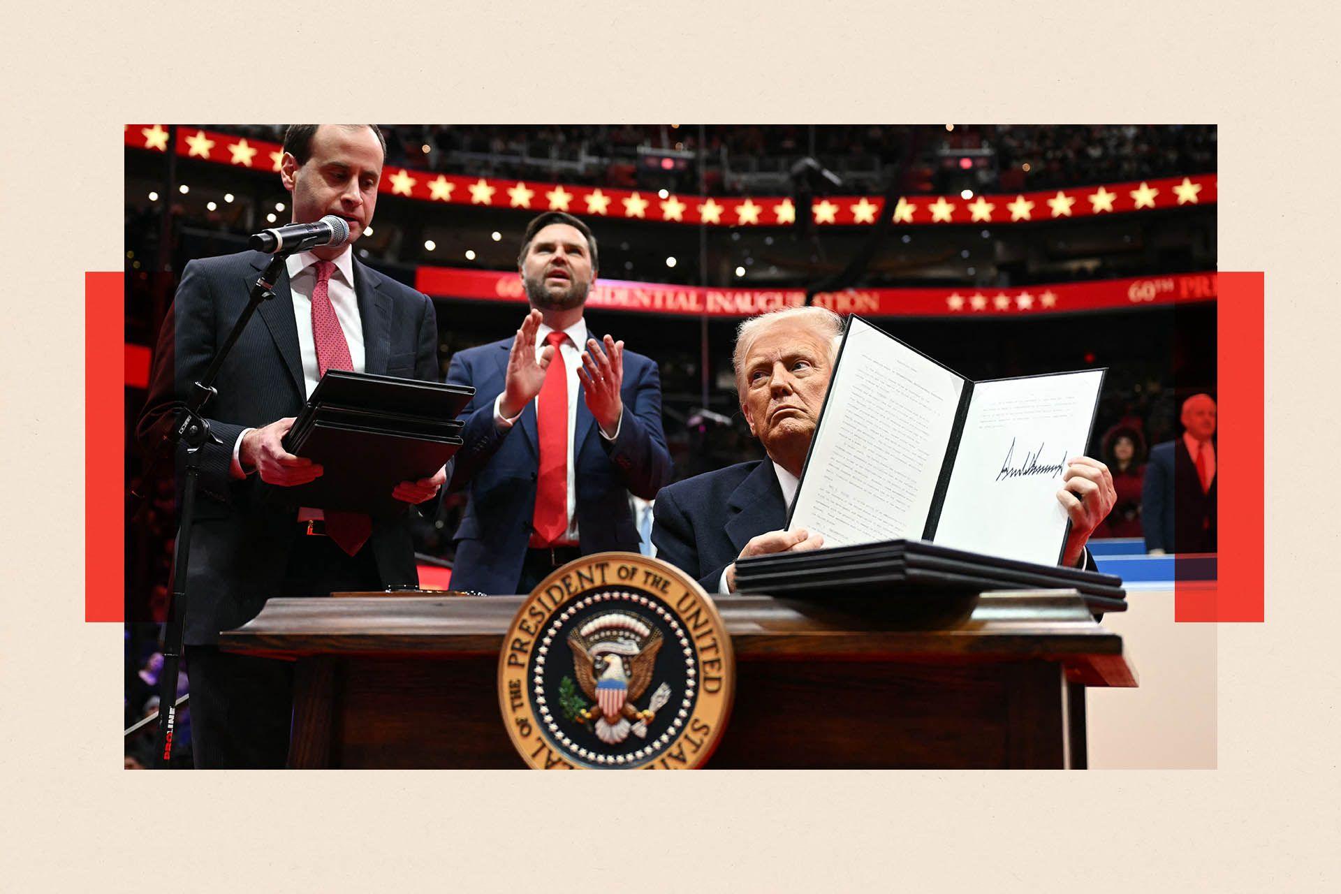 US President Donald Trump holds an executive order announcing the US withdrawal from the Paris Agreement