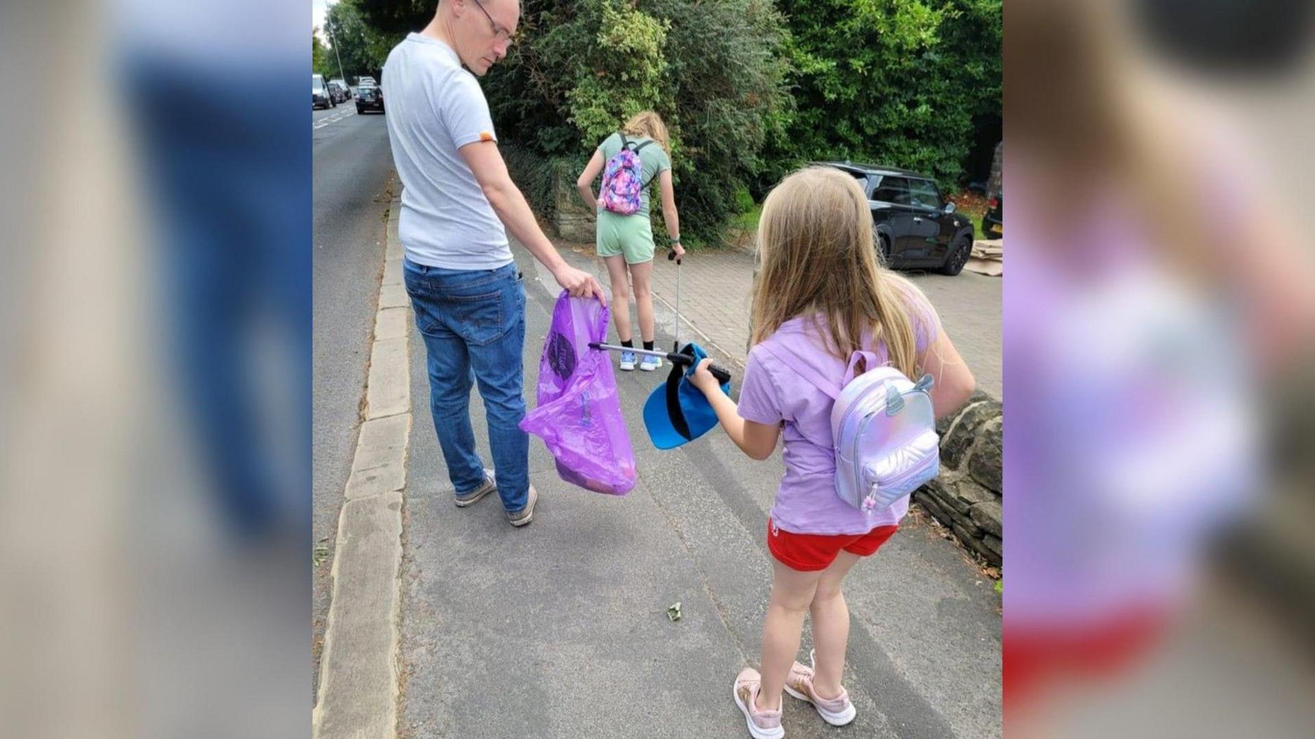 Matilda Pritchard out litter picking with her family