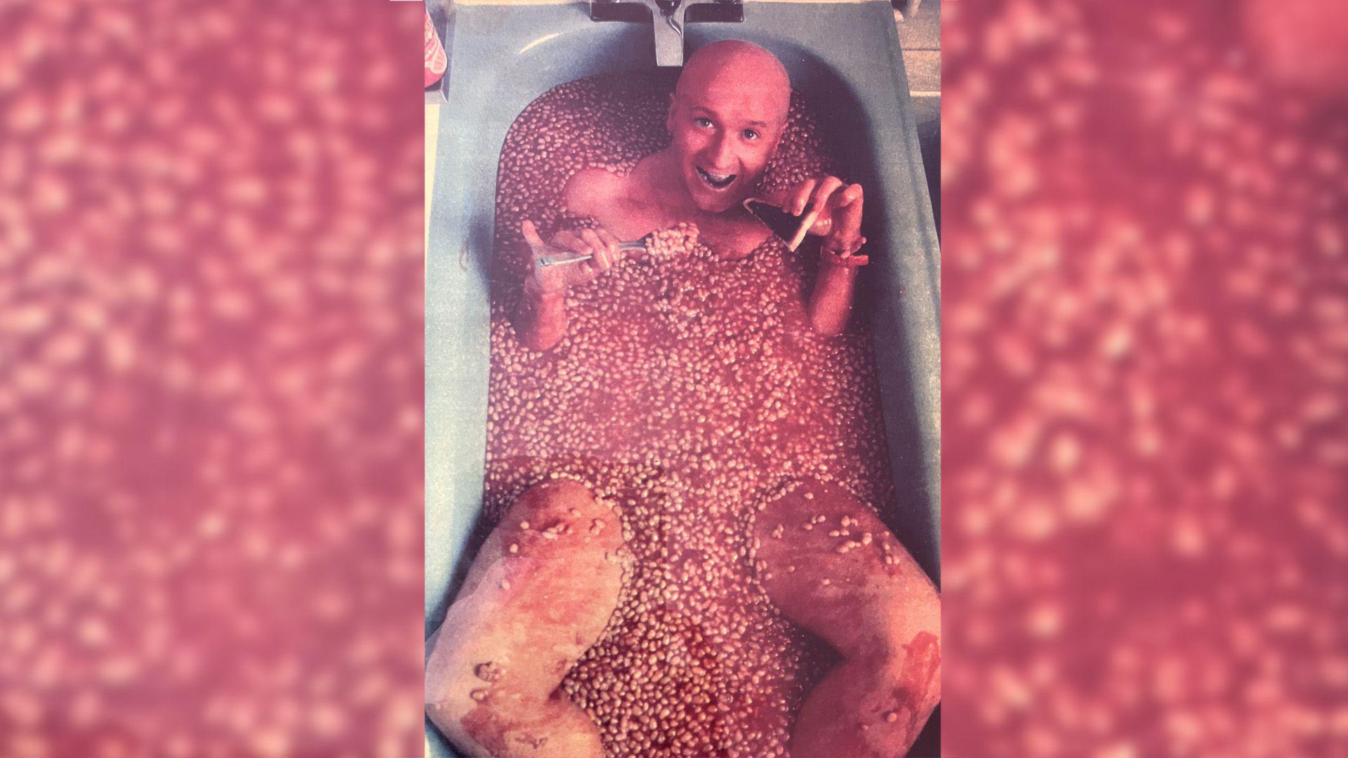 Barry Kirk in a bath of beans in 1986