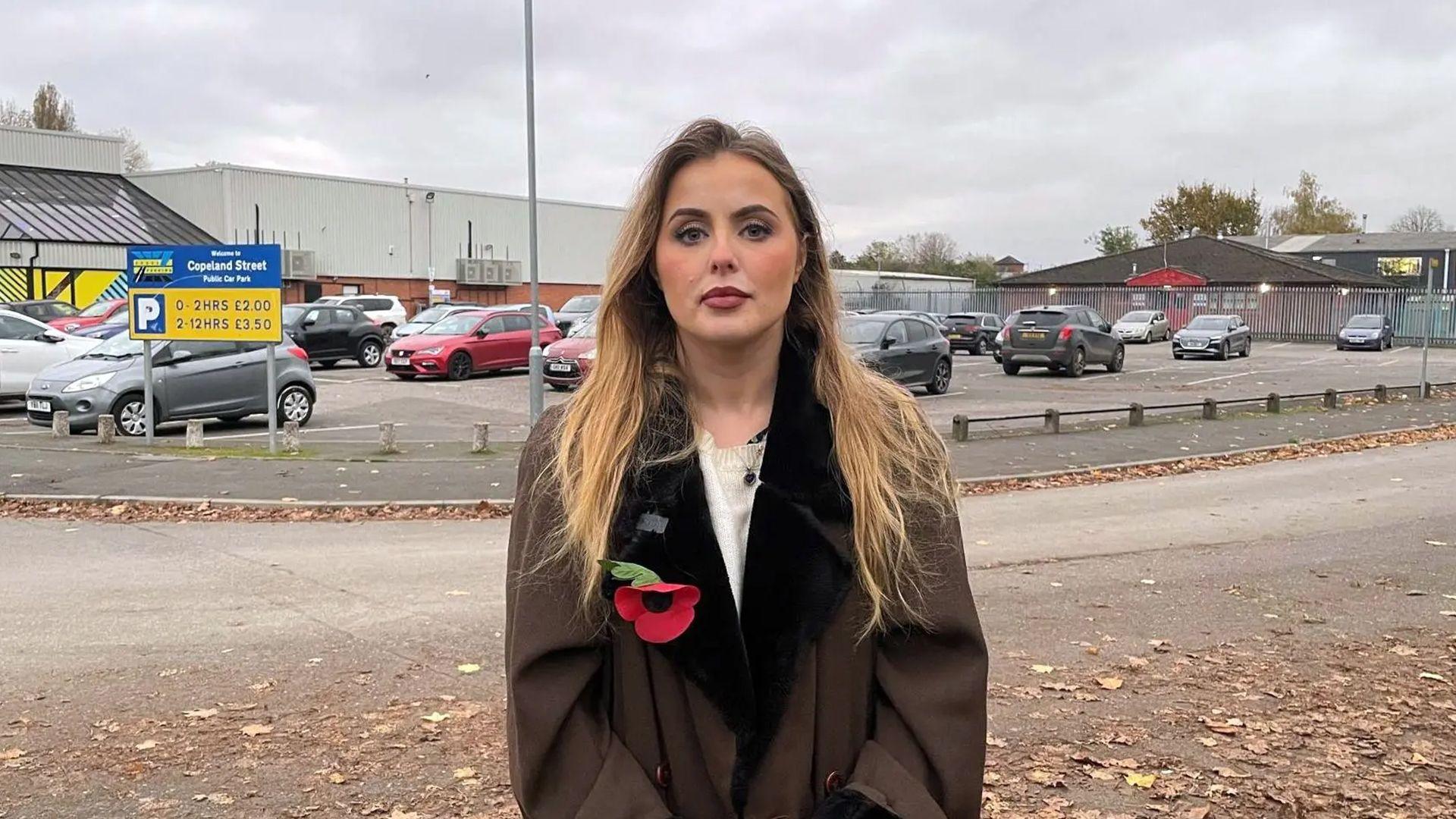 Rosey Hudson standing in front of Excel Parking car park on Copeland Street in Derby