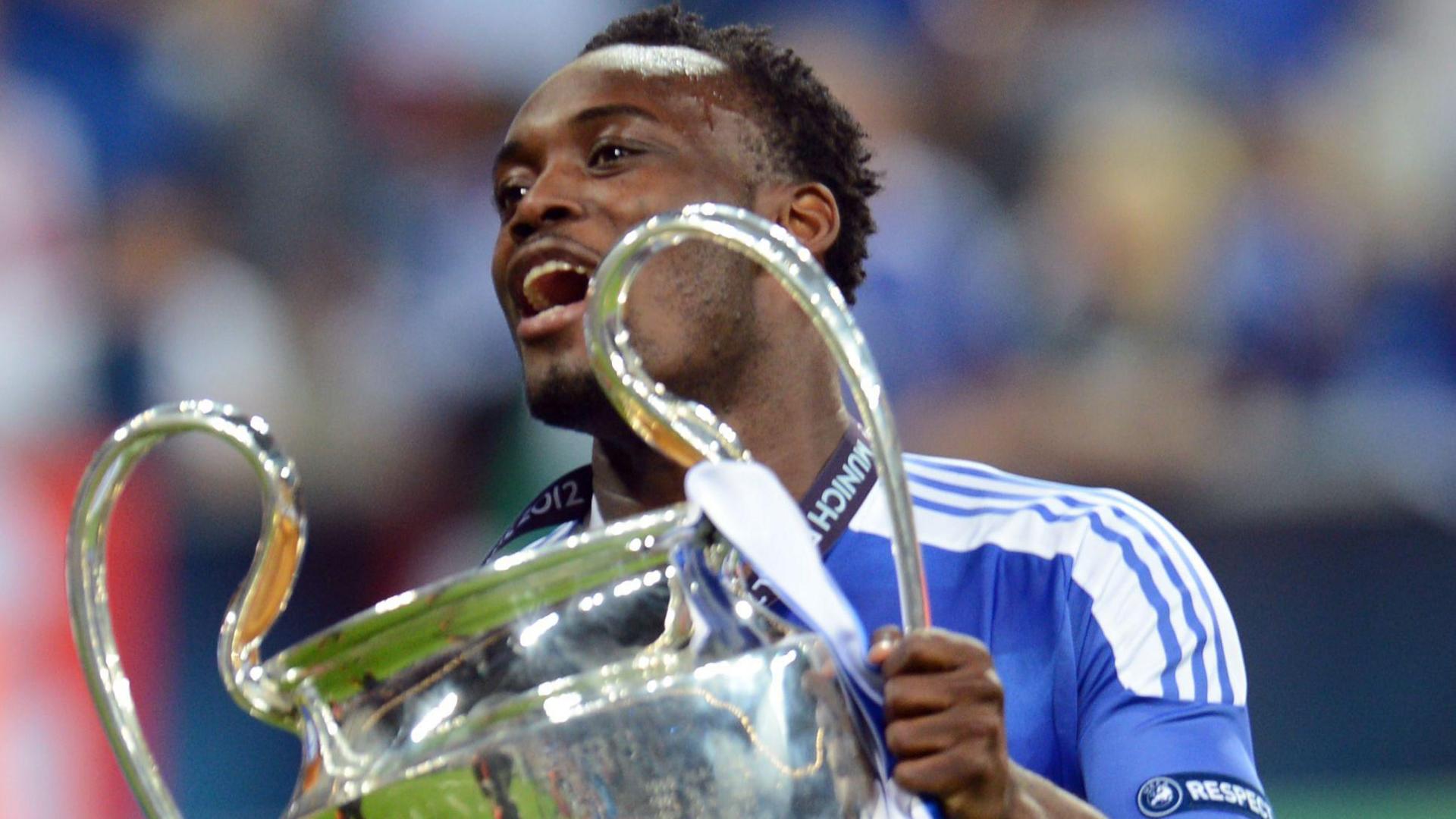 Michael Essien holds the Champions League trophy