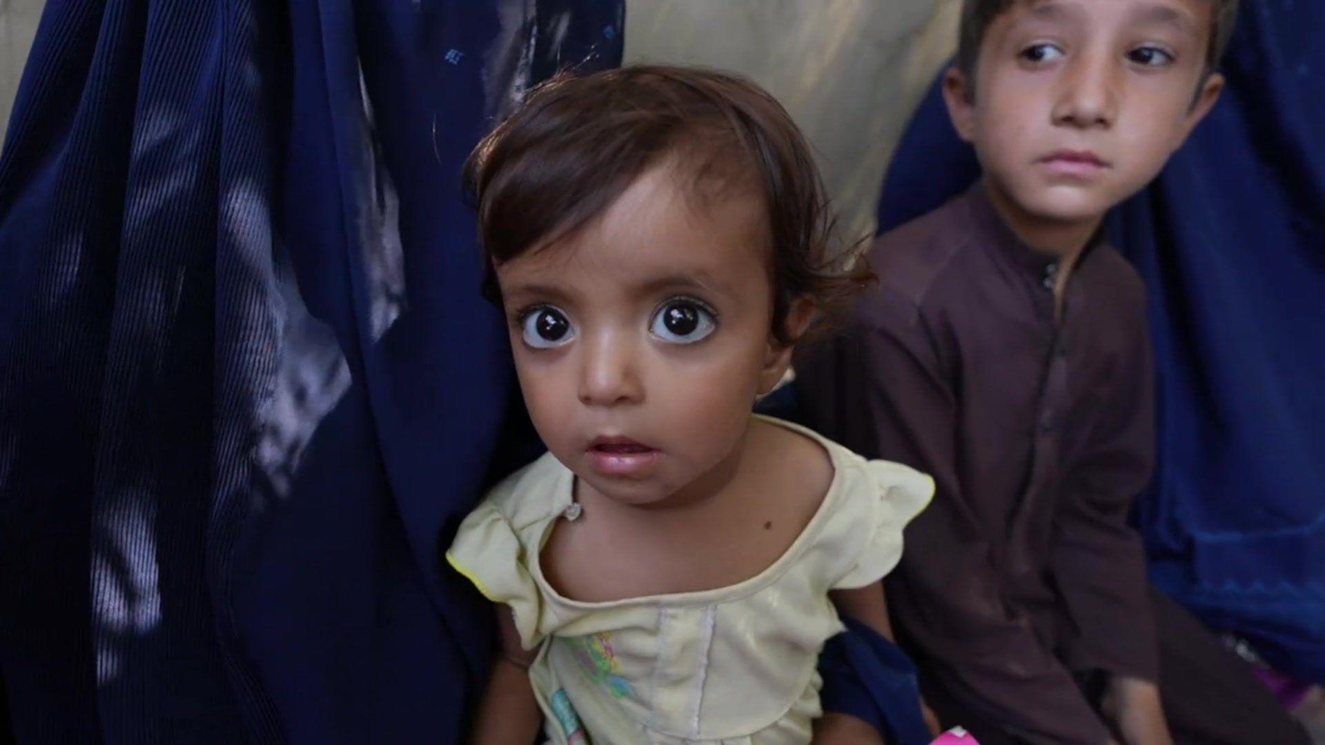 Children and their families queuing up for medical care