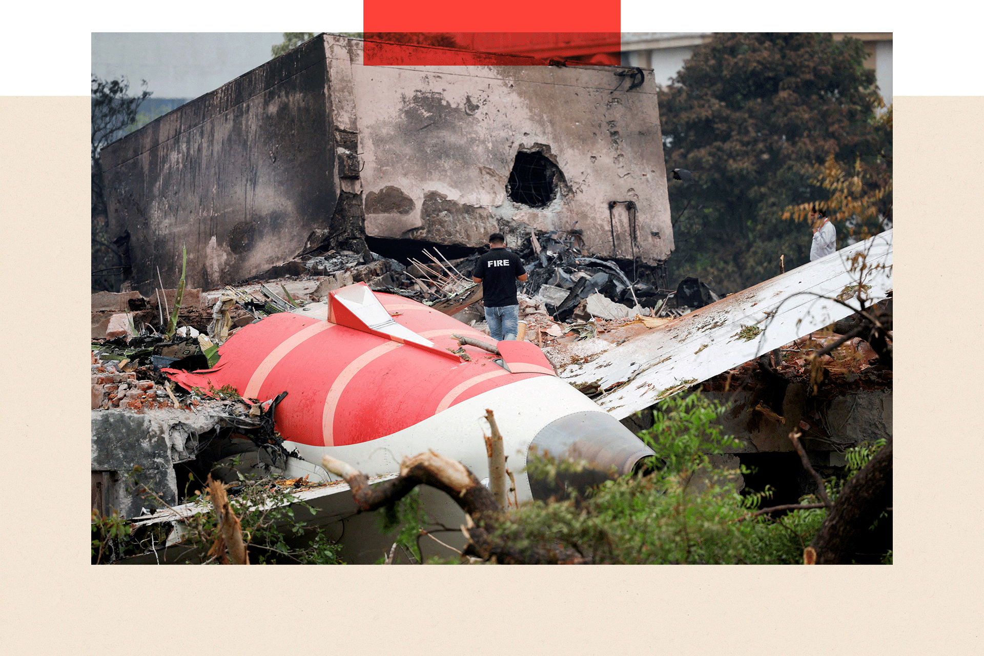A firefighter stands next to the crashed Air India Boeing 787-8 Dreamliner aircraft, in Ahmedabad, India, on 13 June 2025.