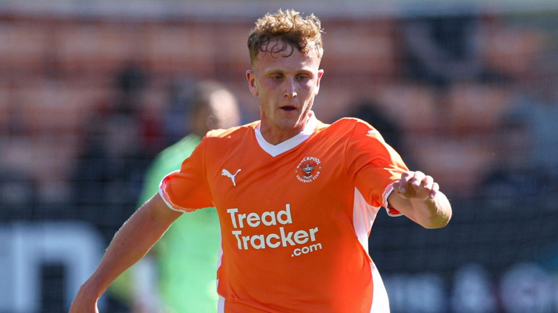 Ryan Finnegan in action for Blackpool