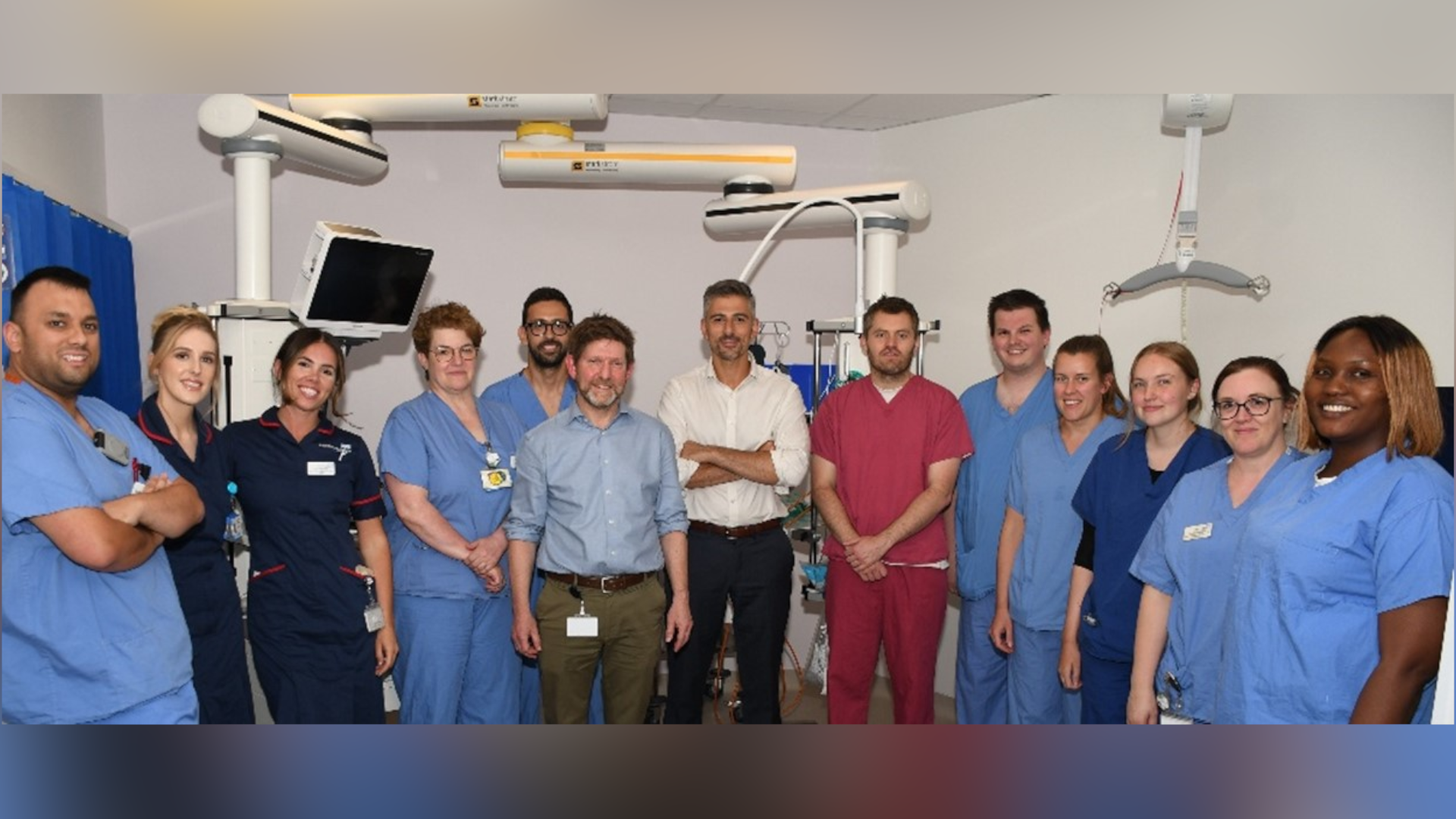 The multi-disciplinary TAVI team at Royal Papworth Hospital with Dr Charis Costopoulos, pictured centre wearing a white shirt.