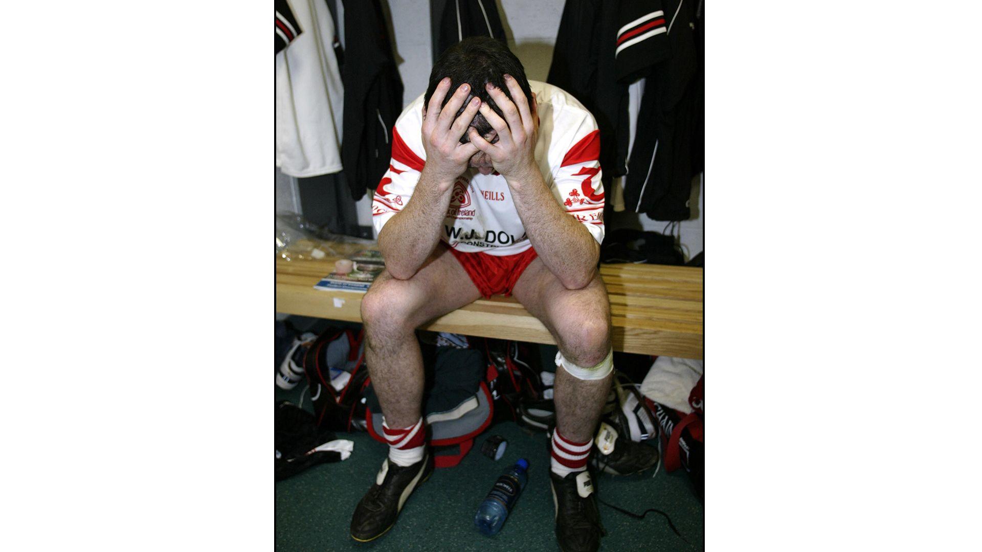 Tyrone captain Brian Dooher in the dressing room after a match