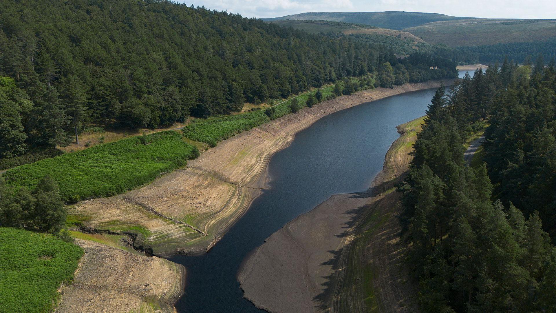 An aerial photograph taken with a drone of low water levels at Howden Reservoir, 29 July 2026.
