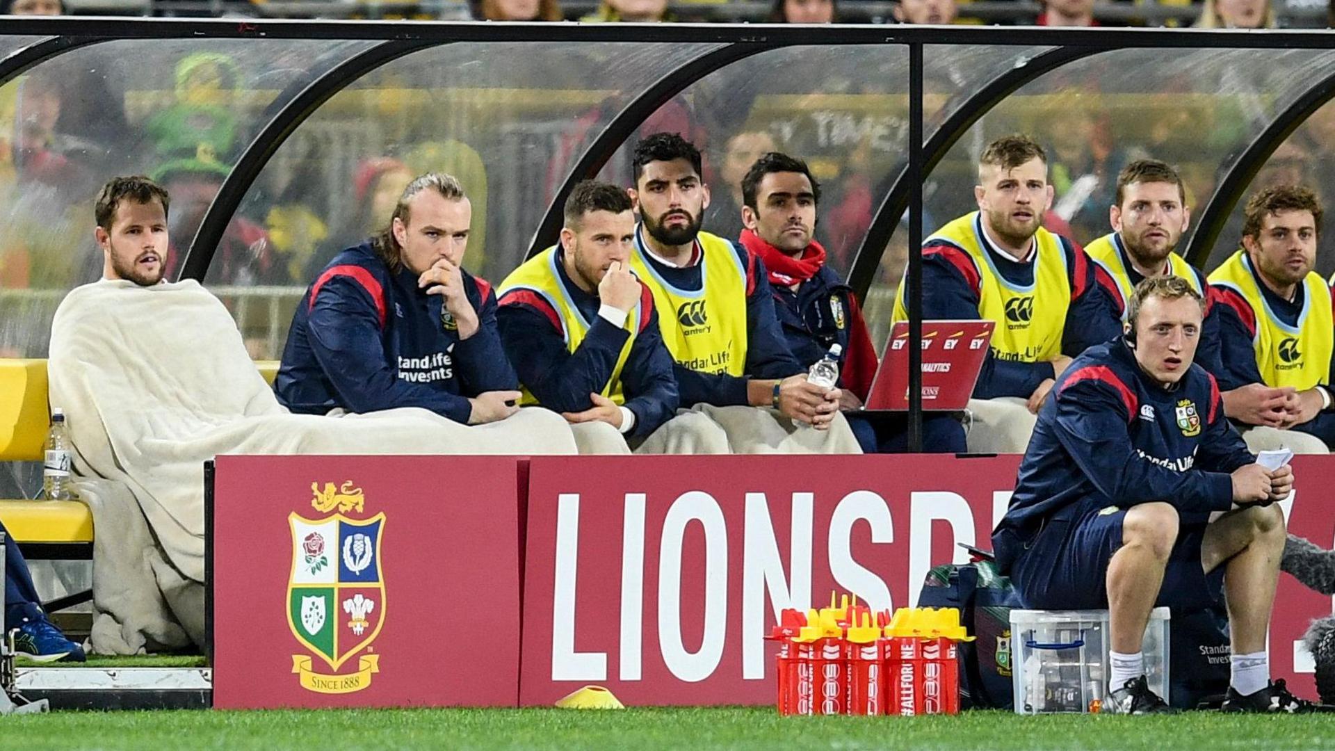 Allan Dell, Kristian Dacey, Gareth Davies and Cory Hill all watch on from the bench