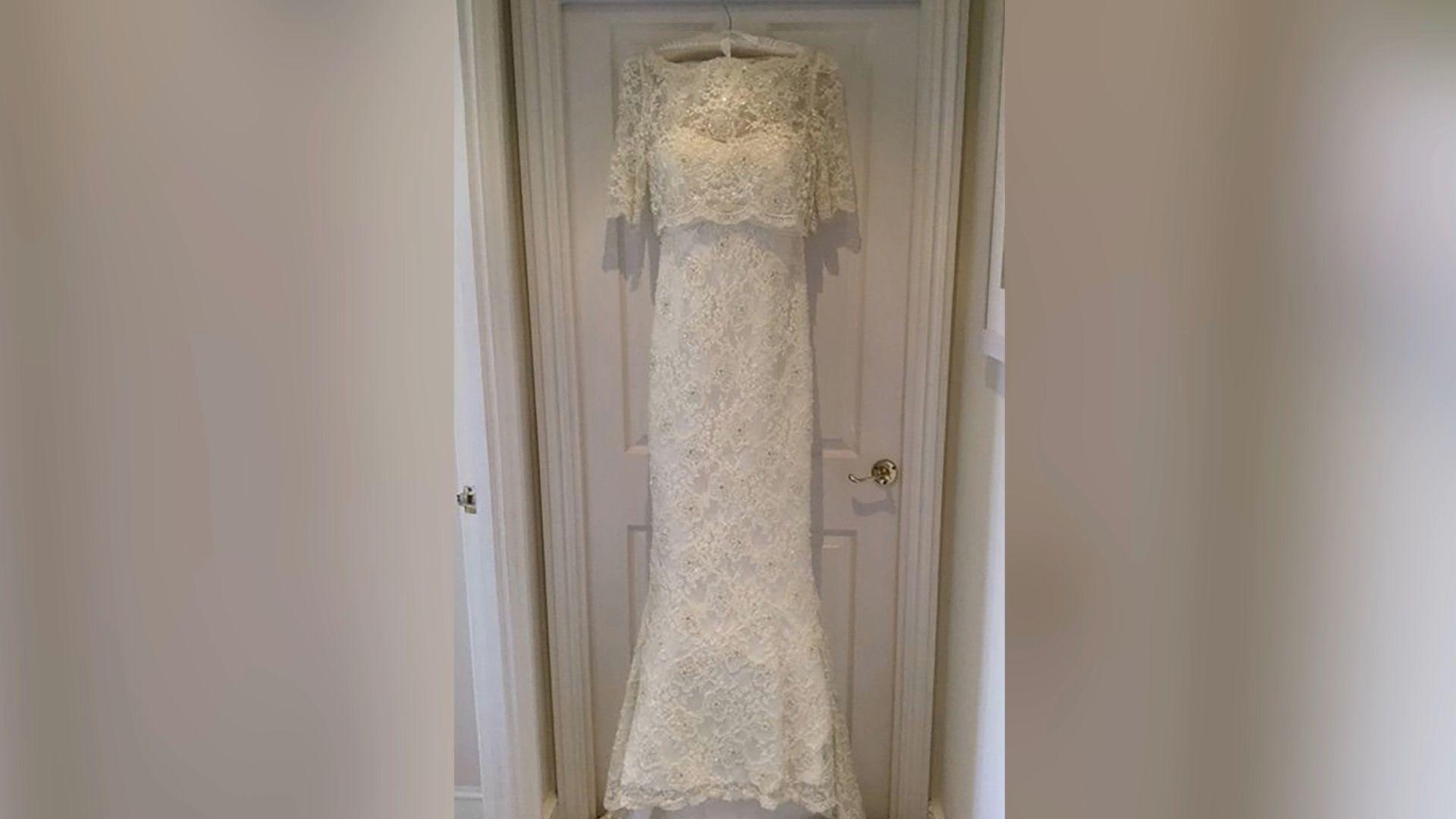 Still of a wedding dress hanging up