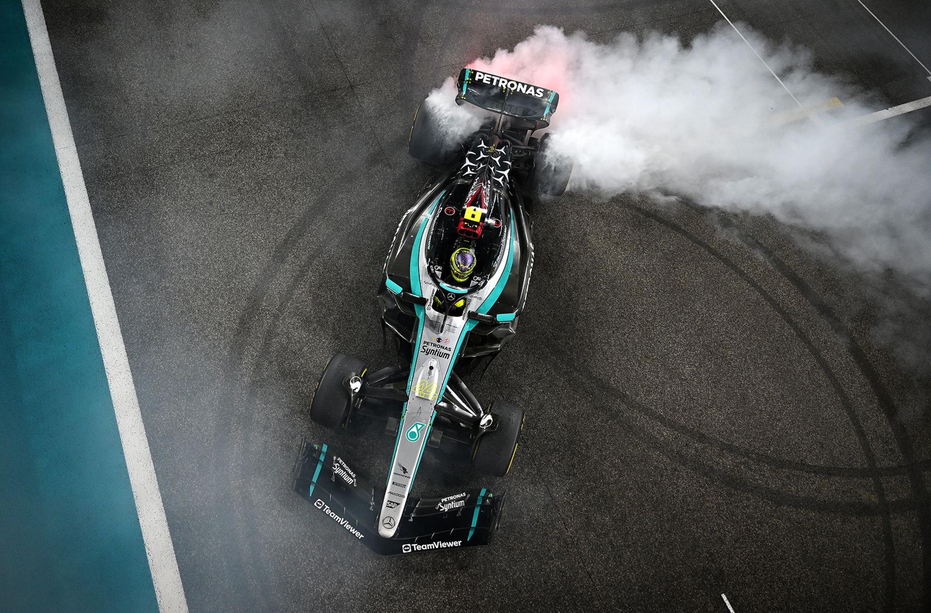 And Hamilton performs donuts on track to celebrate after finishing fourth