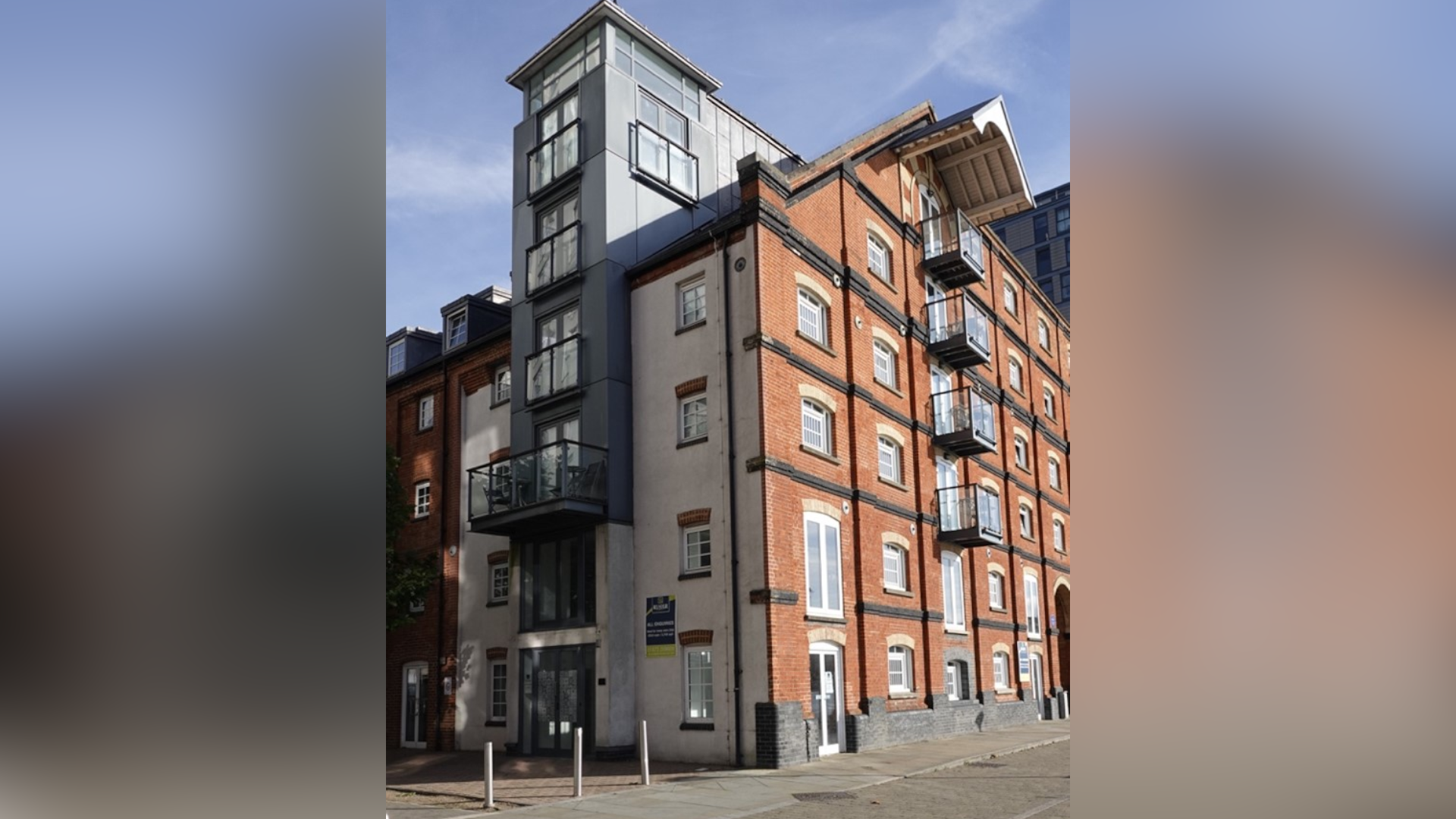 A view of the exterior of the Regatta Quay building on the Ipswich waterfront. It is a tall building with multiple storeys. 
